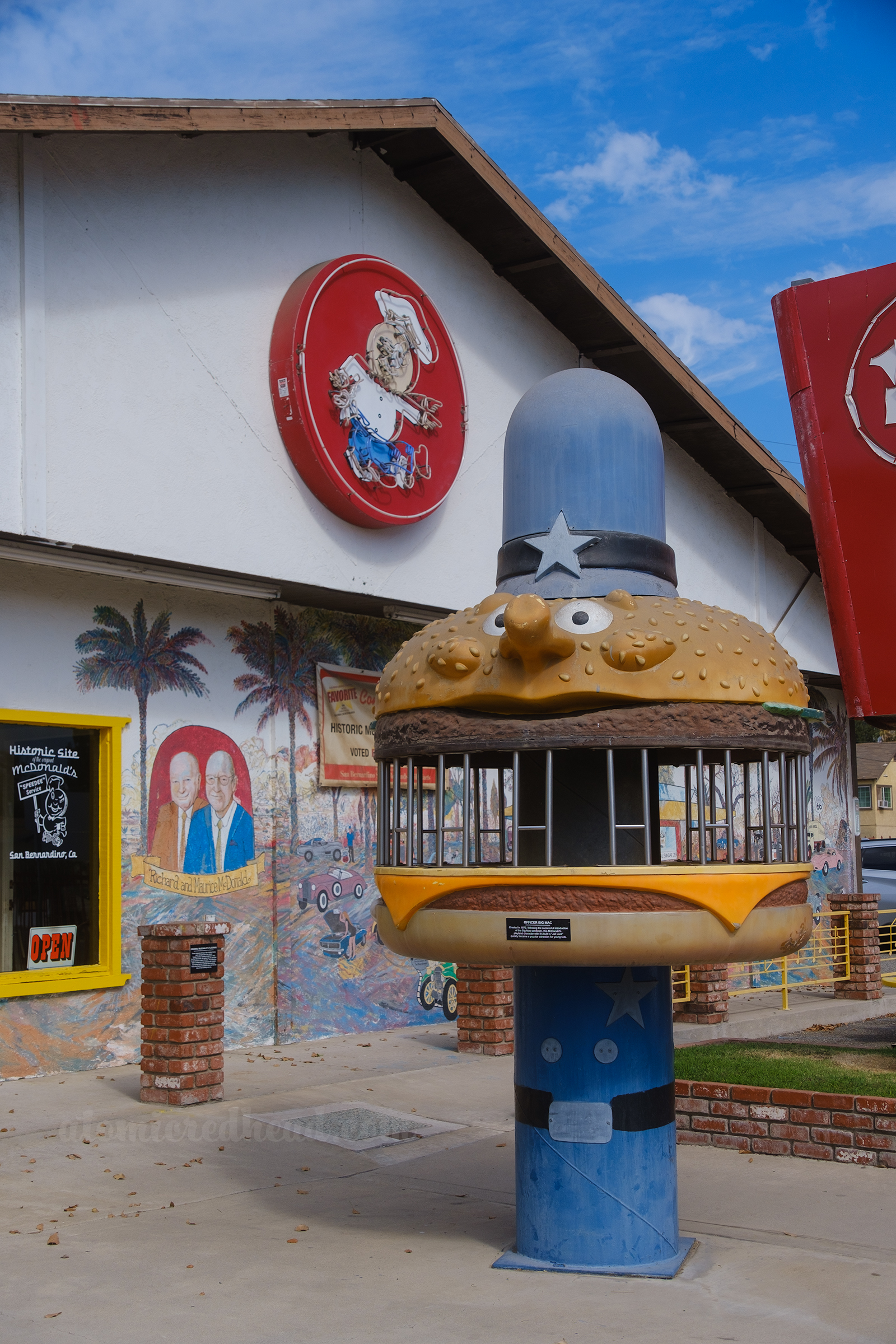 The jail done in the style of Officer Big Mac, a police officer with a burger as a head.