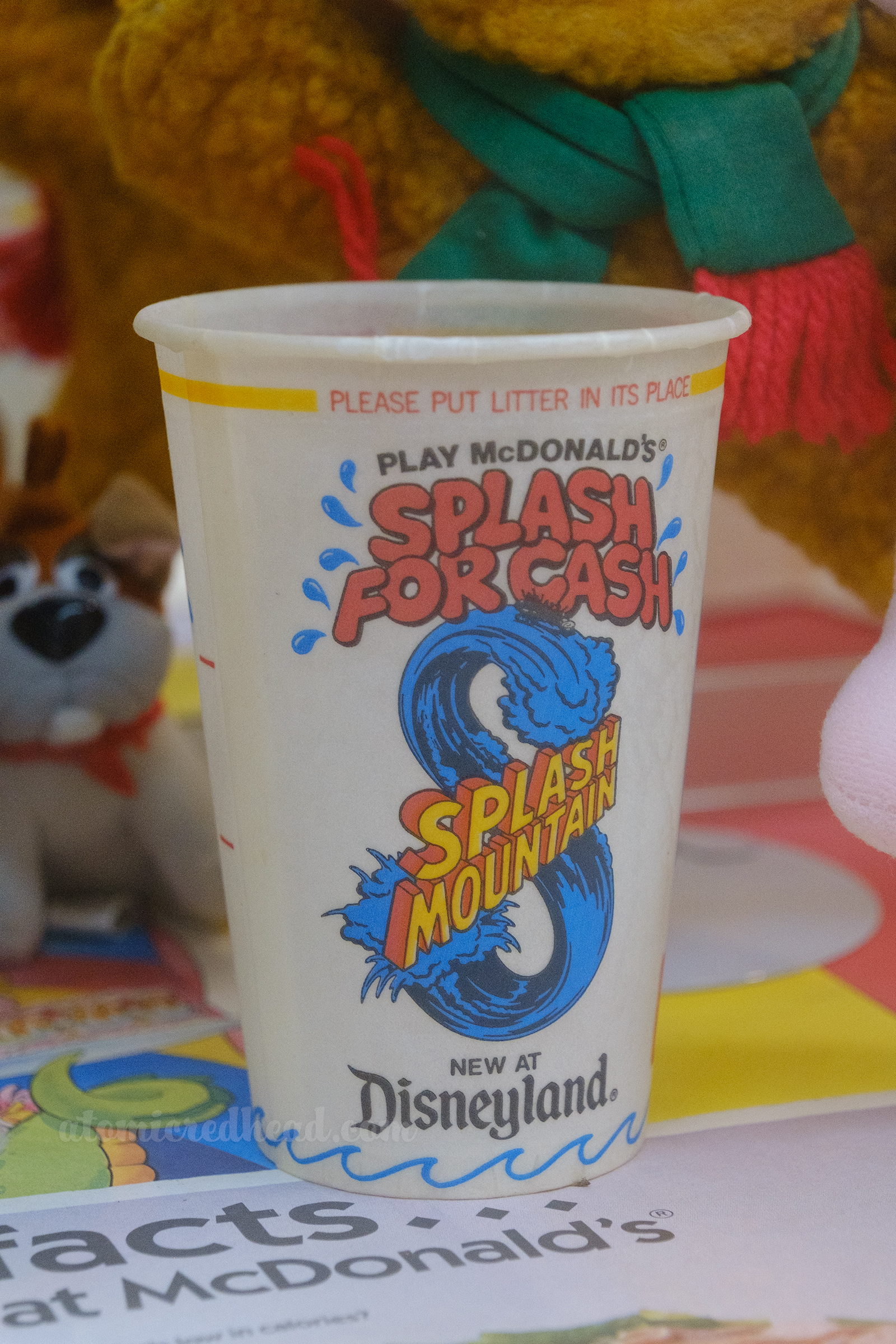 A wax paper cup promoting Disneyland's Splash Mountain.