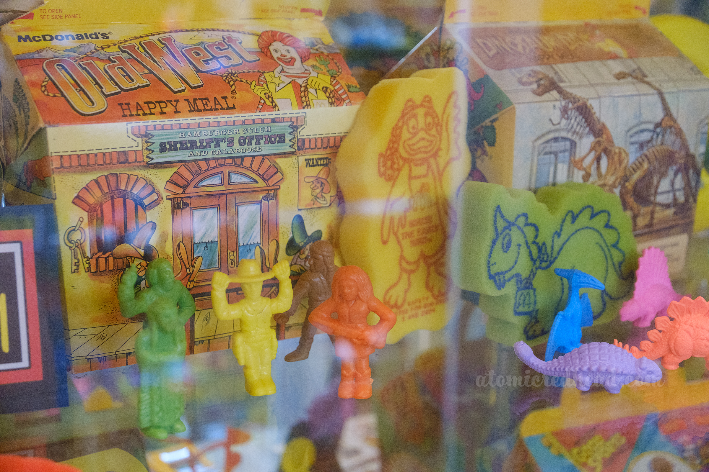 Close-up of an early Happy Meal, which featured western style figures and an old west building printed on the Happy Meal box.