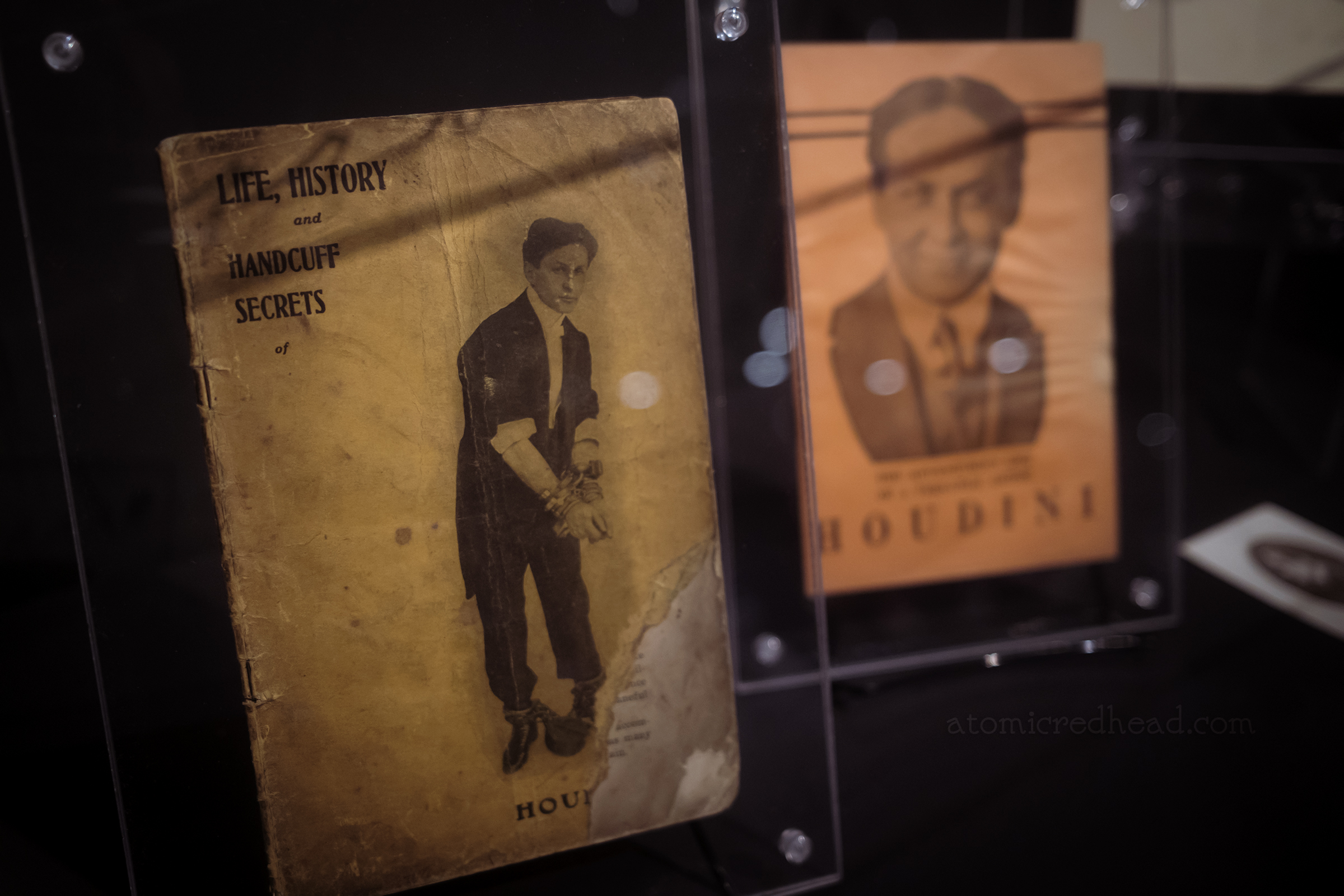 Two booklets written by Houdini, both of which feature his image on them.