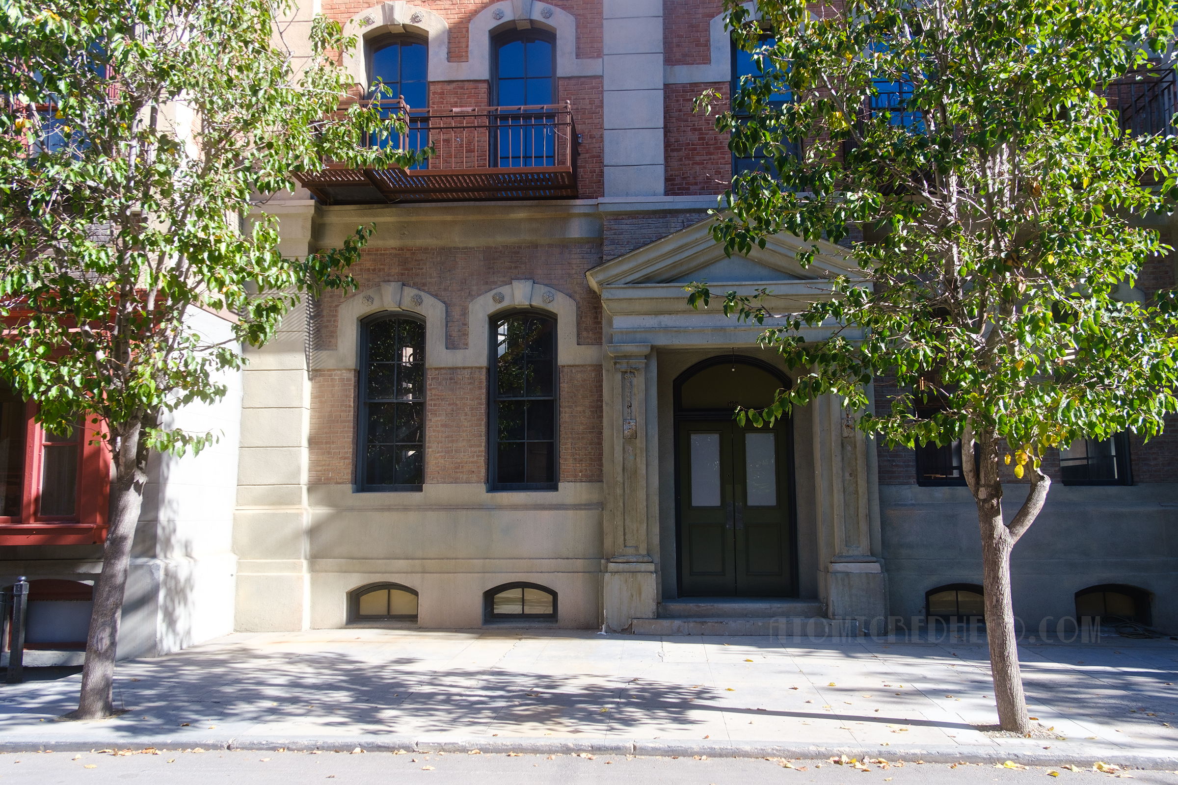 A brick and stone facade that is part of Hennessy Street, which evokes both old San Francisco and New York City.