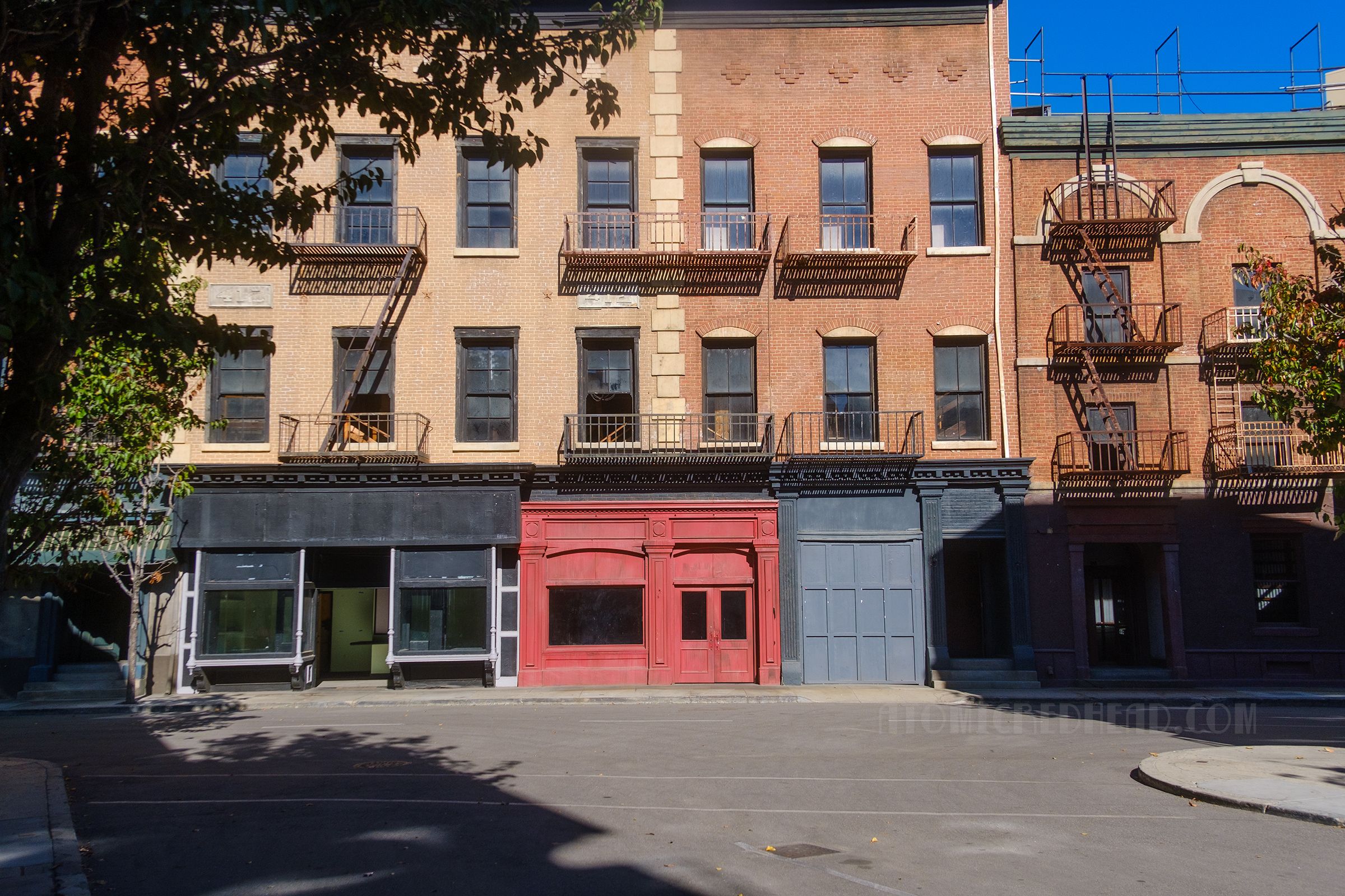 A brick and stone facade that is part of Hennessy Street, which evokes both old San Francisco and New York City.