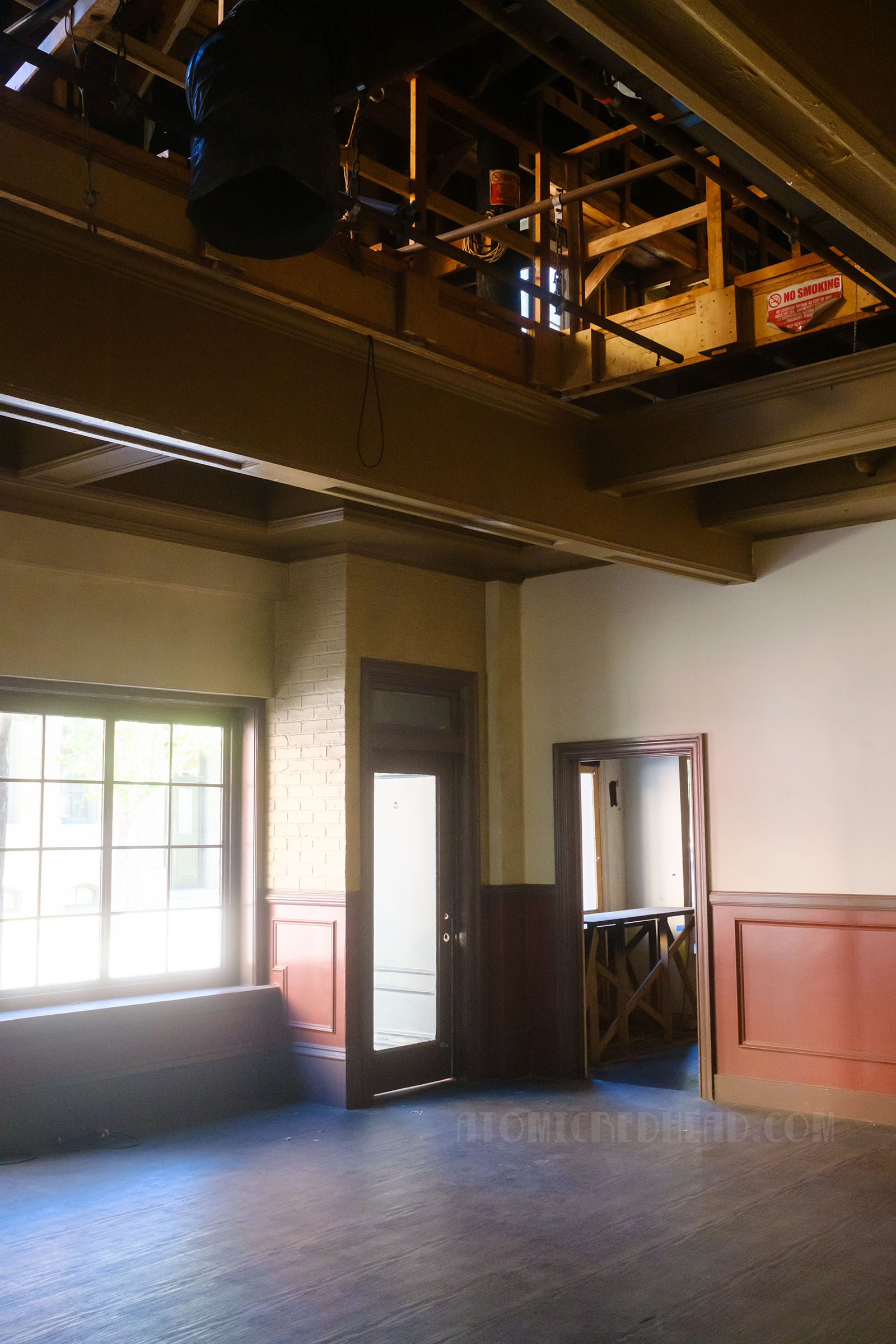 Inside one of the buildings of Hennessy Street, which features a removed ceiling to allow space for film lights and microphones.