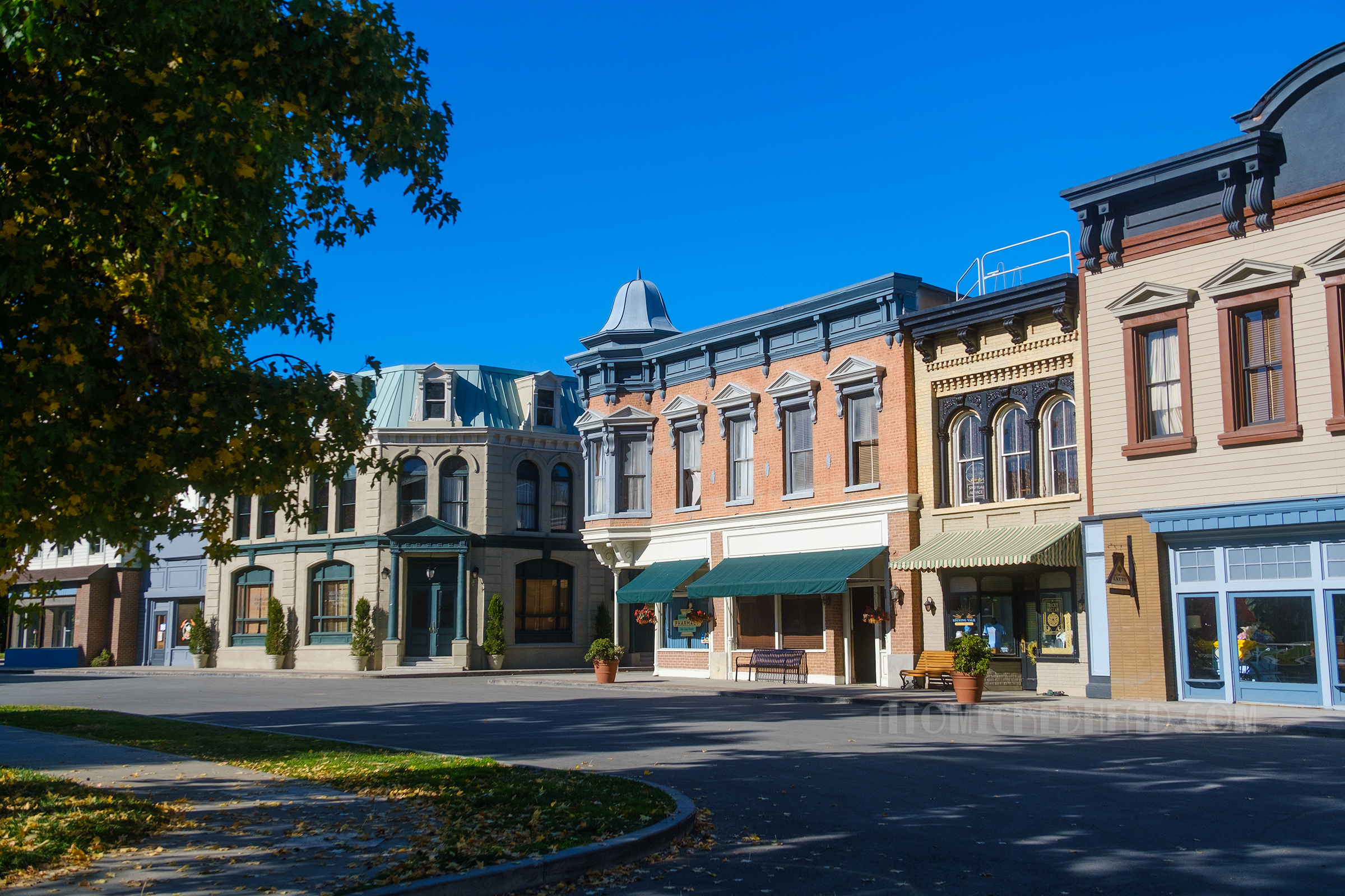A portion of Midwest Street that features brick and stone buildings reminiscent of a quaint small town of the turn-of-the-century. 