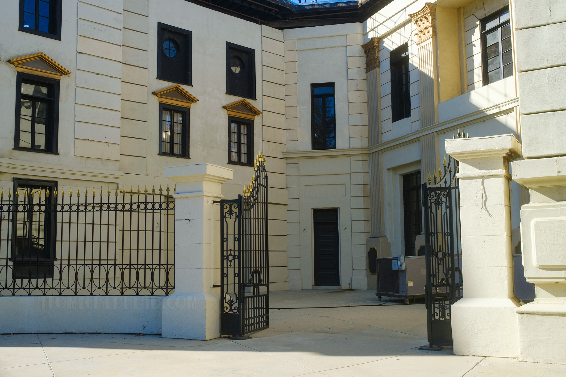 A regal stone building known as Embassy Courtyard which was featured in Brisco as the Westerfield Club. 