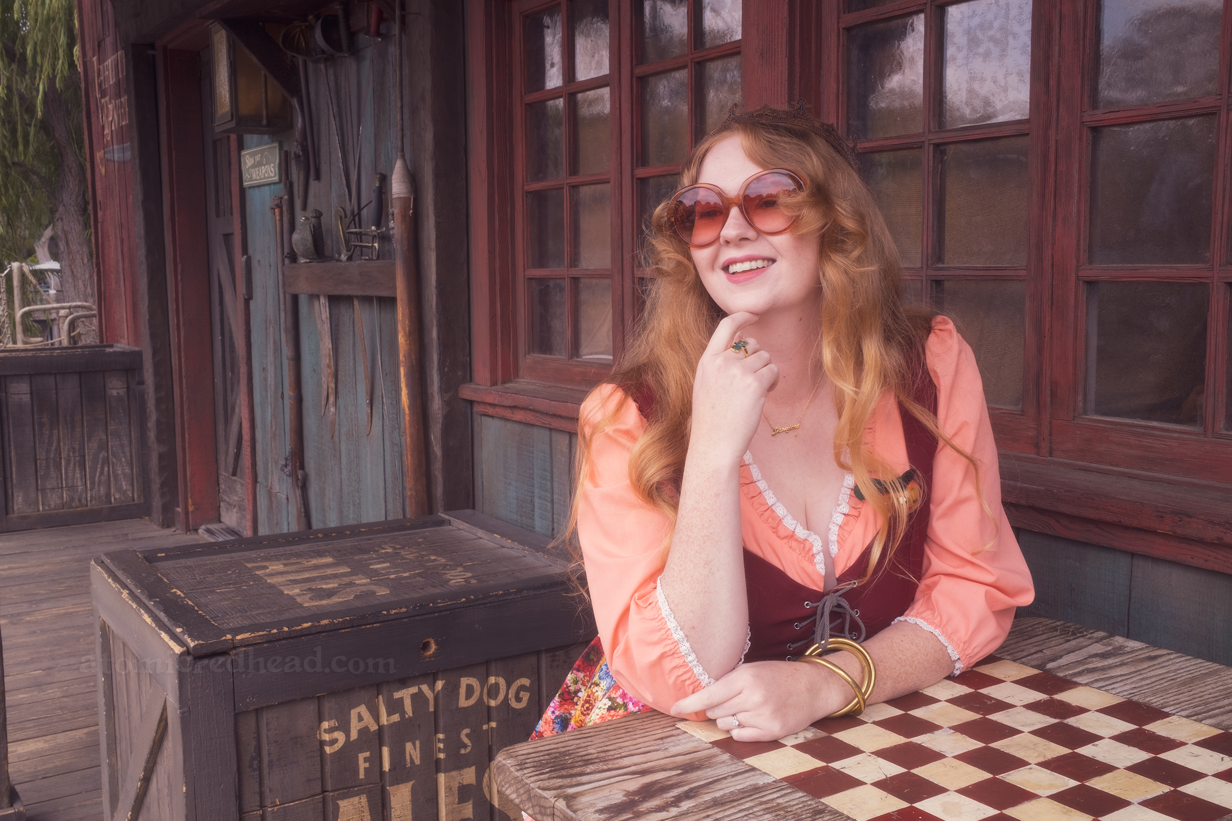 Myself seated at a table with a checkerboard painted on top.
