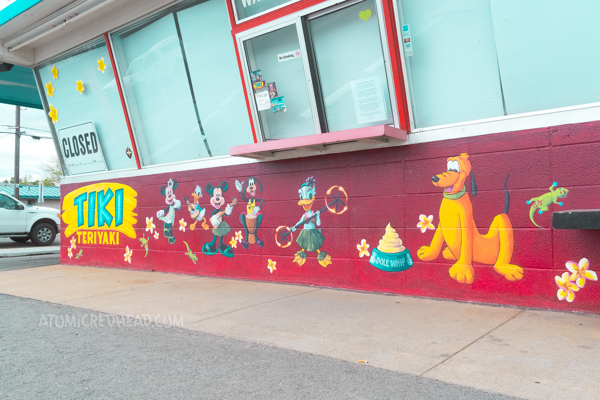 Close-up view of Disney characters in hula attire.