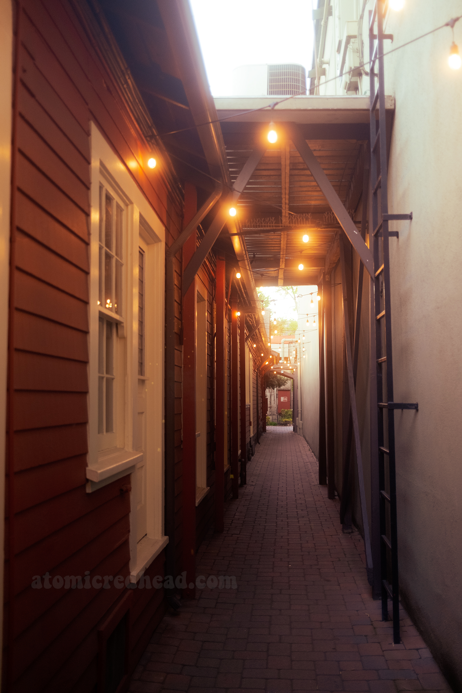 A long, covered alleyway at the studio.