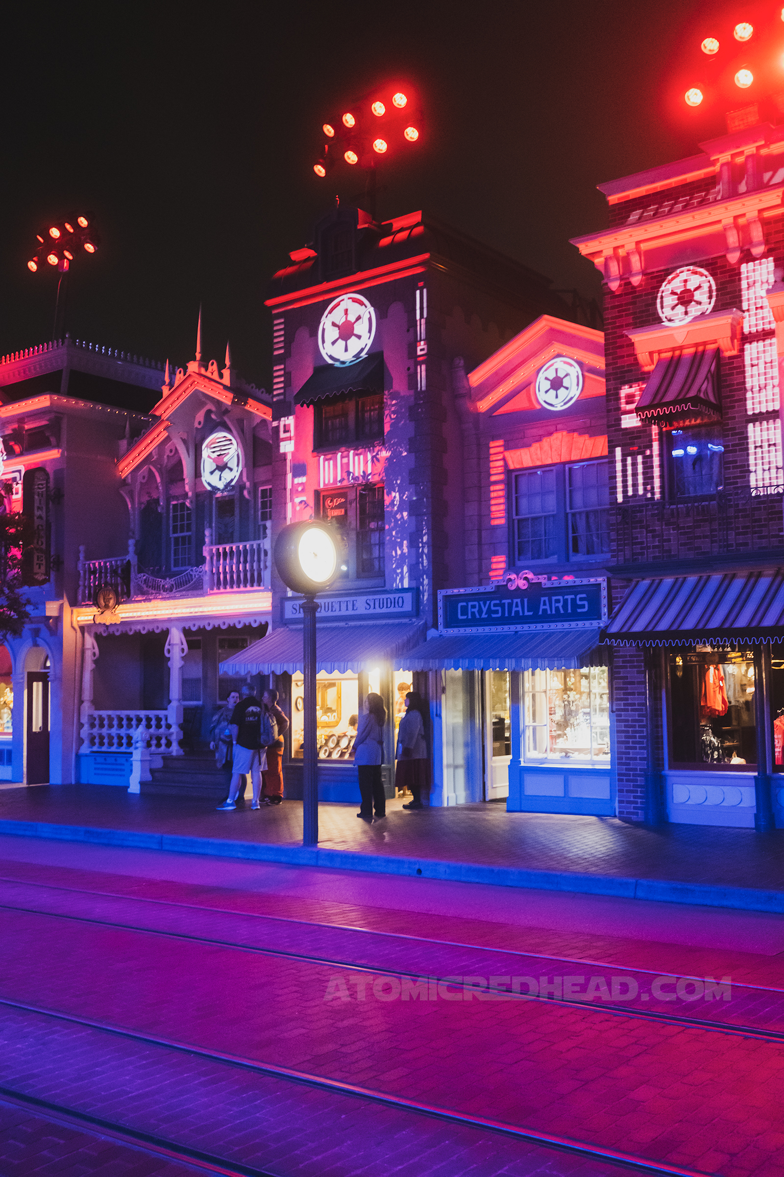 Projections on Main Street buildings give them a space feel and feature the symbol of the Empire.