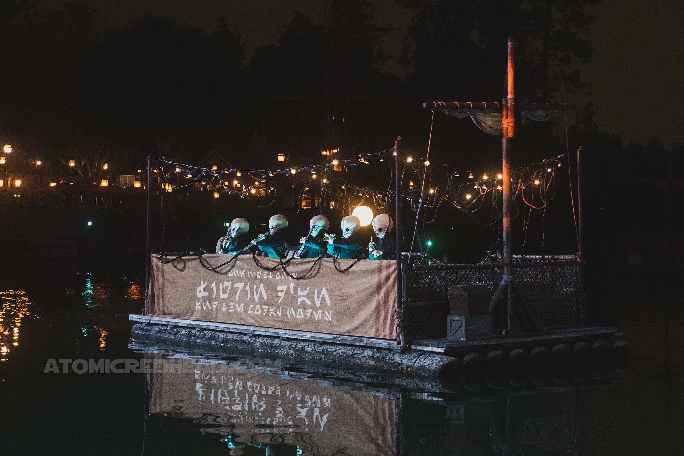 The infamous Cantina band plays on a raft in the middle of the Rivers of America.