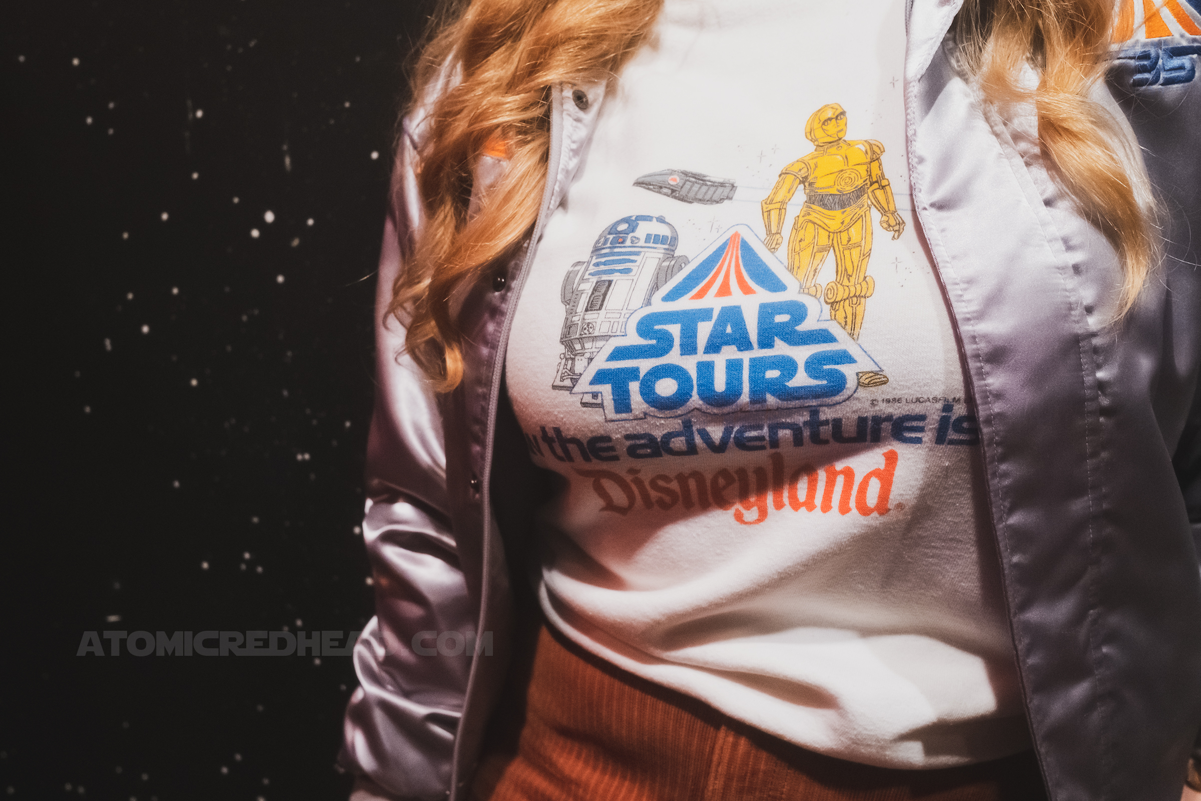 Close-up of my sweatshirt which features R2 and C3PO and reads "Star Tours The Adventure is Real Disneyland"