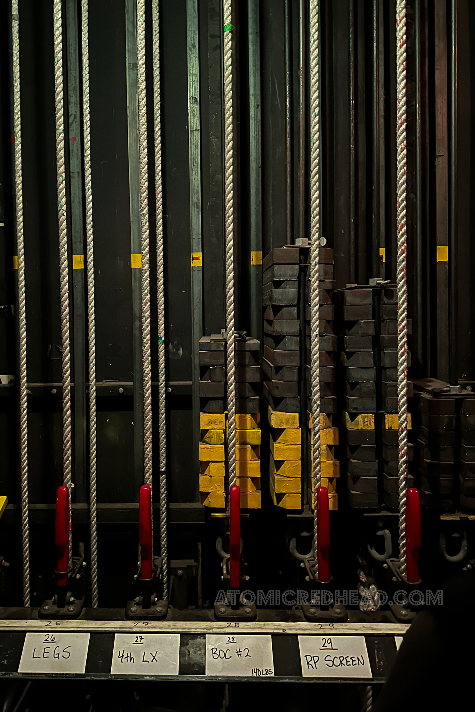 The fly rail backstage for the various curtains and elements that fly in and out of the stage.