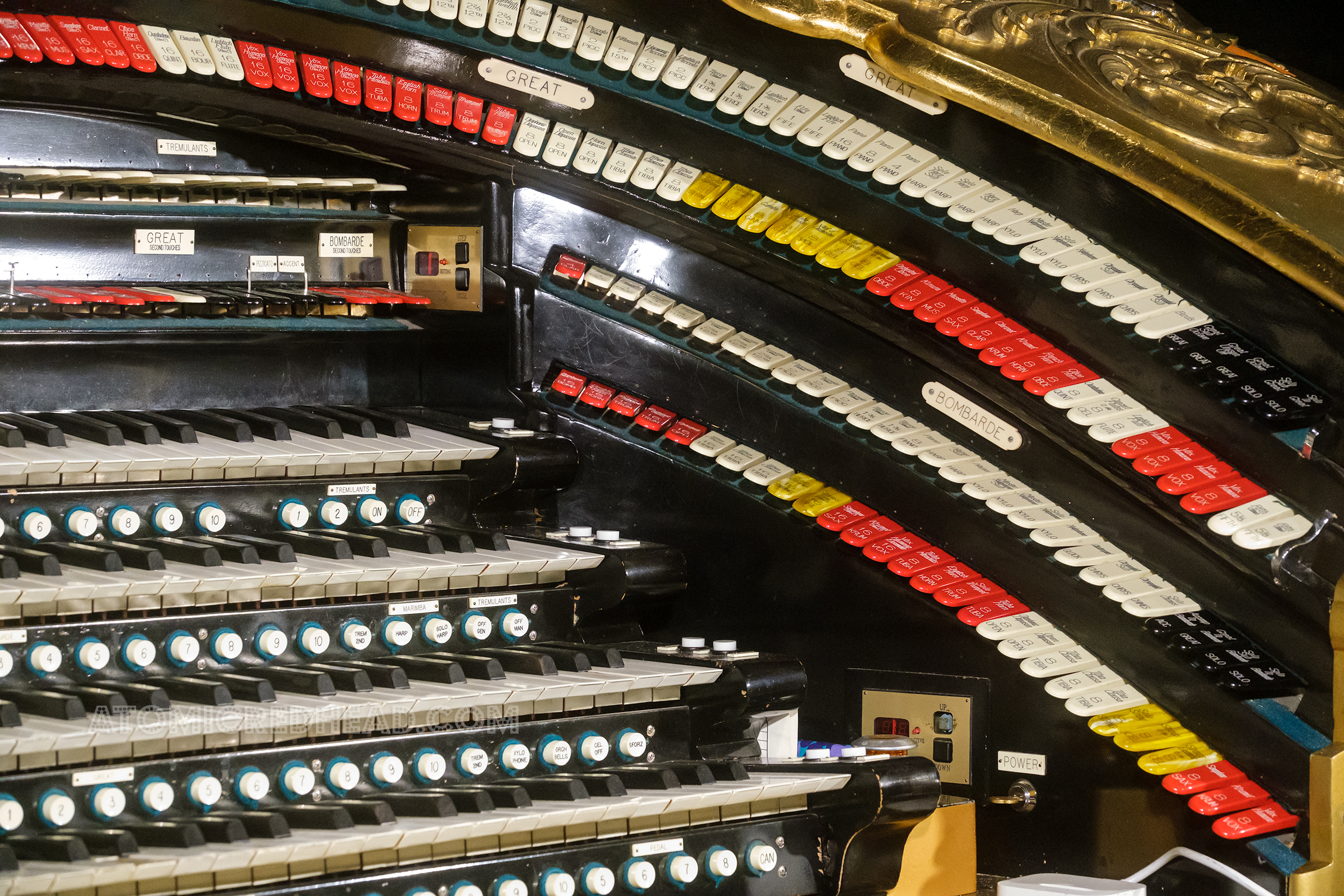 Close-up of the many keys and switches on the organ.