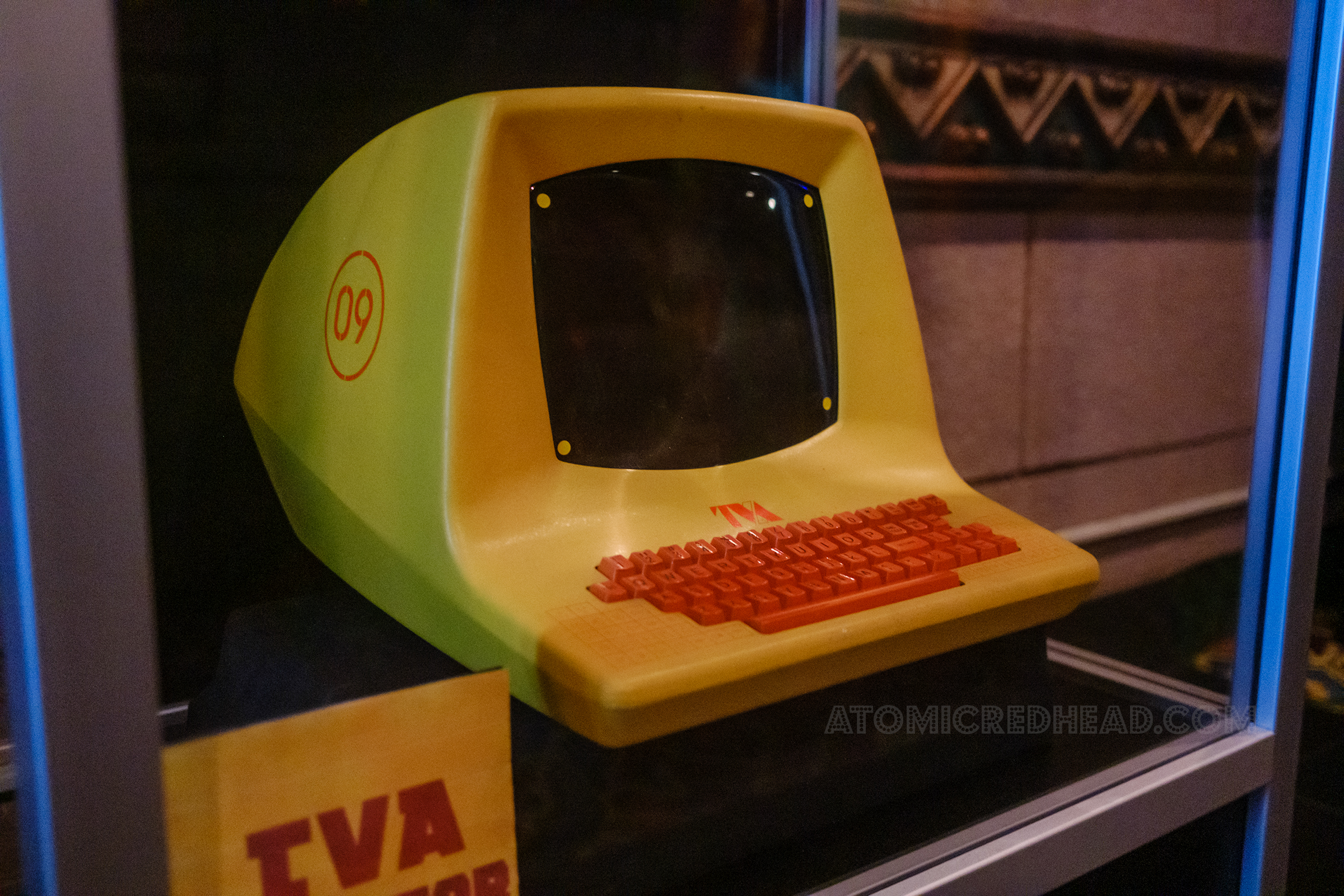 A retro computer used by the TVA in the film, painted yellow with orange keyboard.