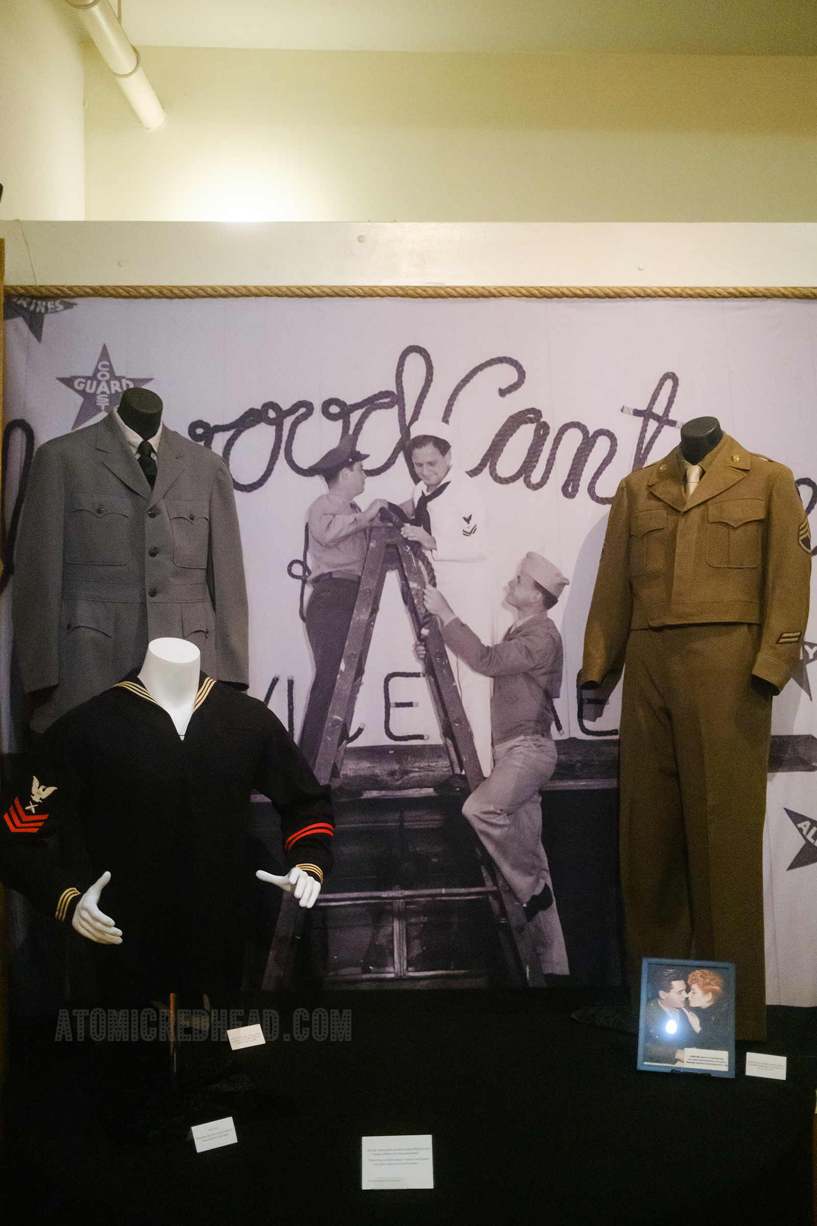 A collection of service uniforms dating to WWII.