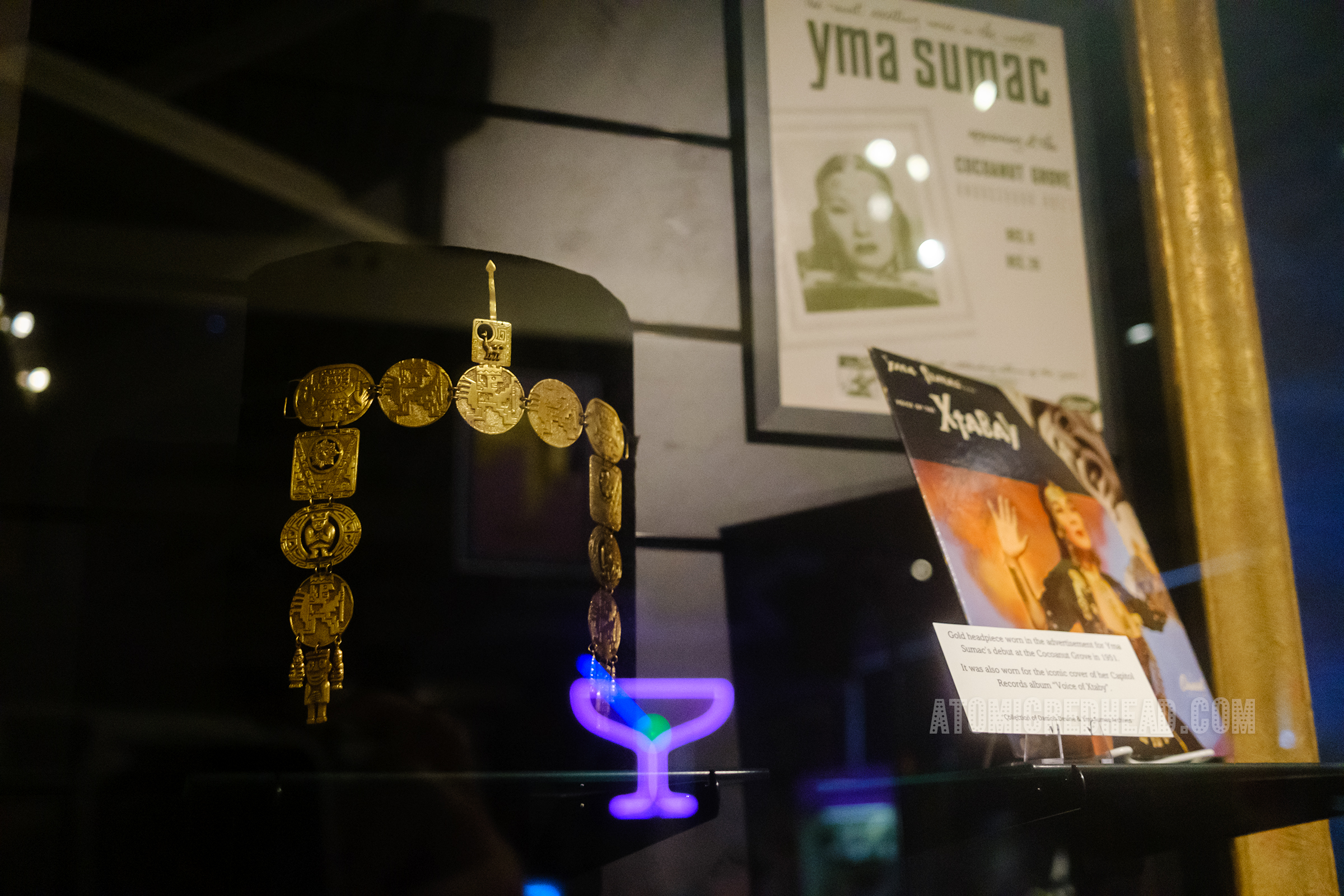 A gold headpiece, appearing to be made of old gold coins.