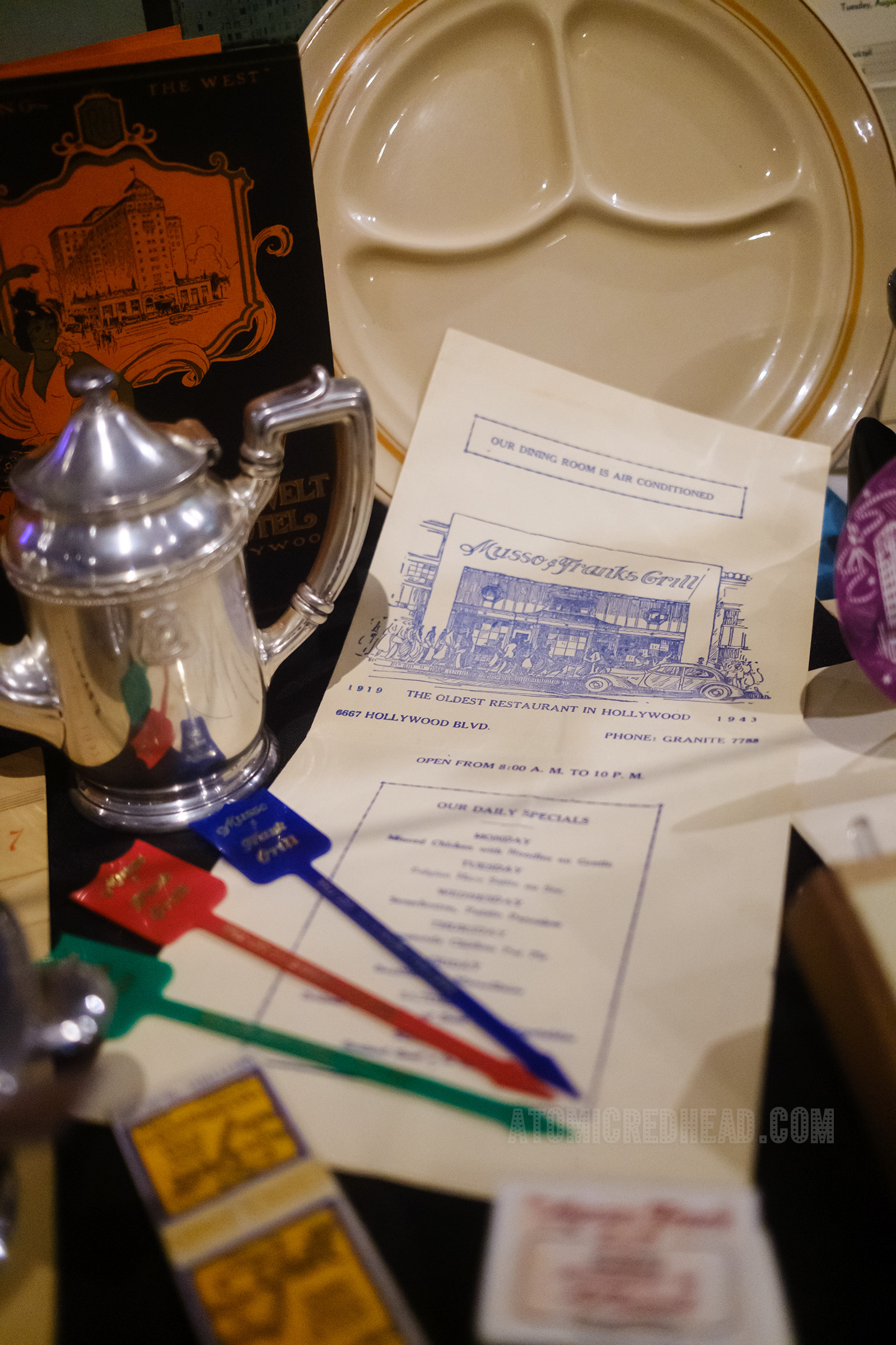 Menu and swizzle sticks from Musso and Frank's Grill.