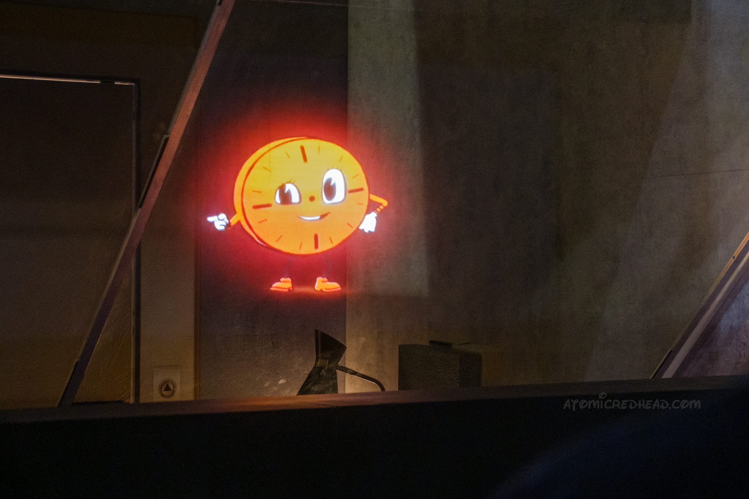 Miss Minutes, an orange, anthropomorphic clock greets us at the TVA.