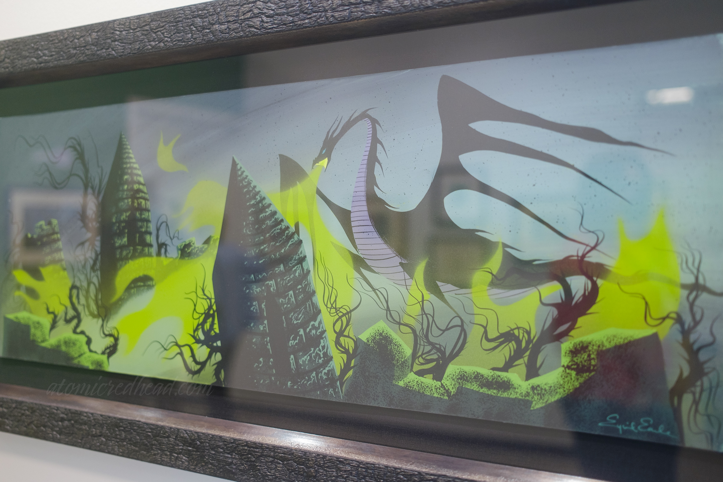 Concept art from Sleeping Beauty, here, Maleficent in Dragon form, of black and purple, breathes green fire to a castle.