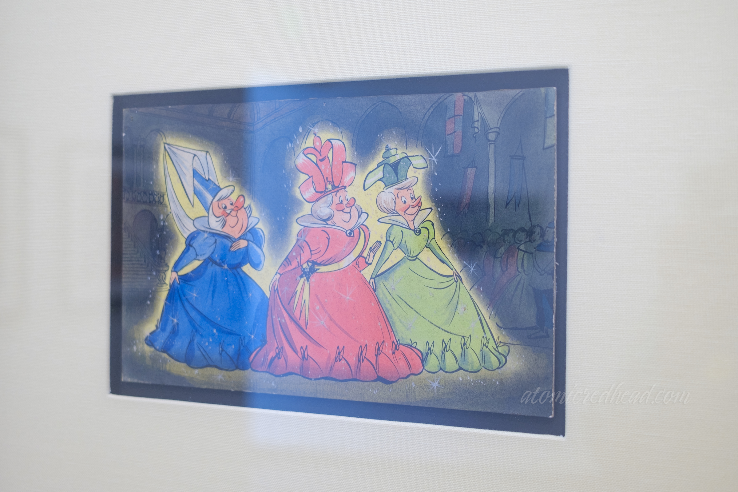 Concept art for the fairies from Sleeping Beauty, all red nosed chubby in colorful dresses.