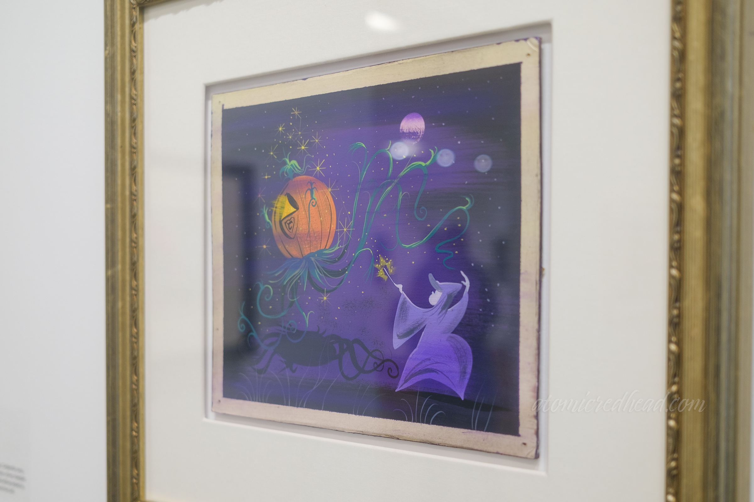 Concept art from Cinderella by Mary Blair, featuring the Fairy Godmother holding her wand changing a pumpkin into a coach.
