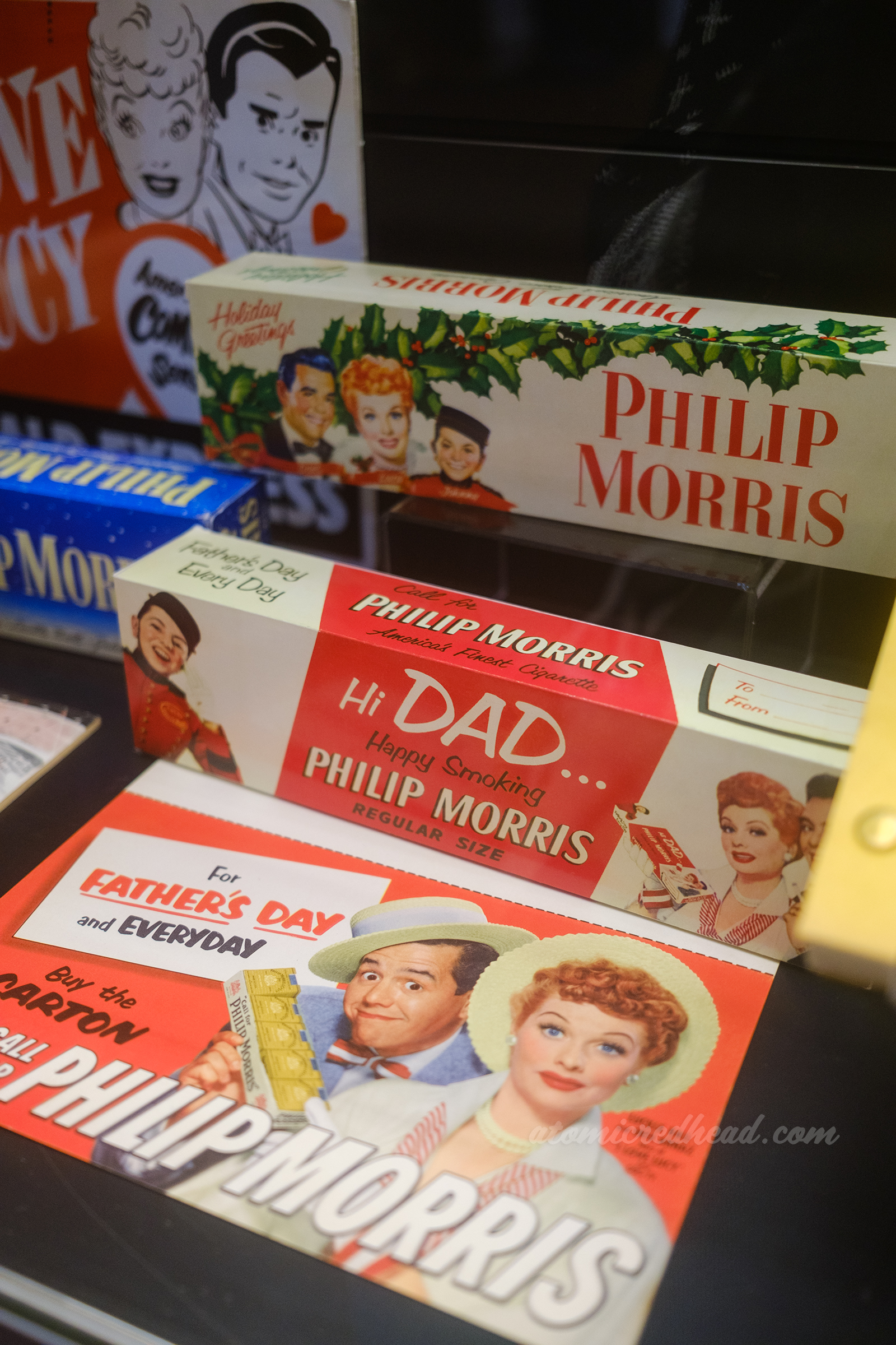Philip Morris cigarette cartons and advertisements for Christmas and Father's Day featuring Lucy and Desi.
