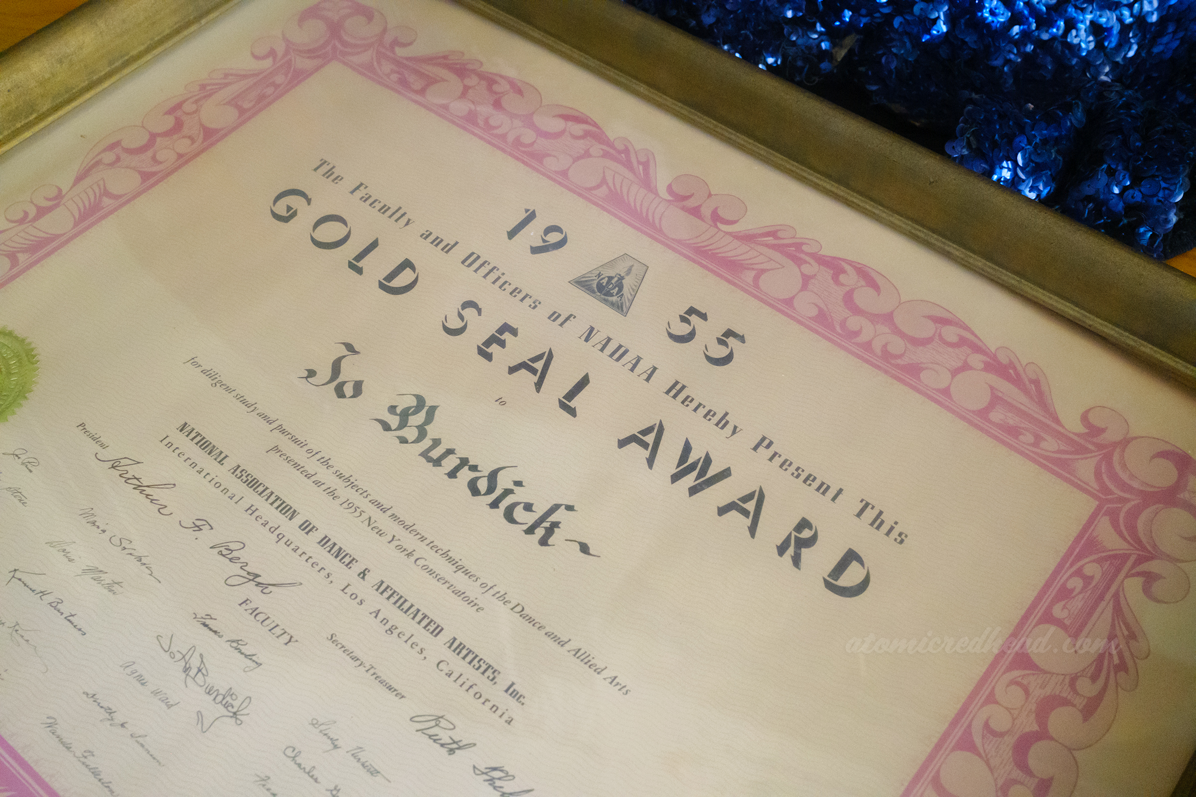 Close-up of Jo An's award, which reads "1955 The Faculty and Officers of NADAA Hereby Present This Gold Seal Award to Jo Burdick"