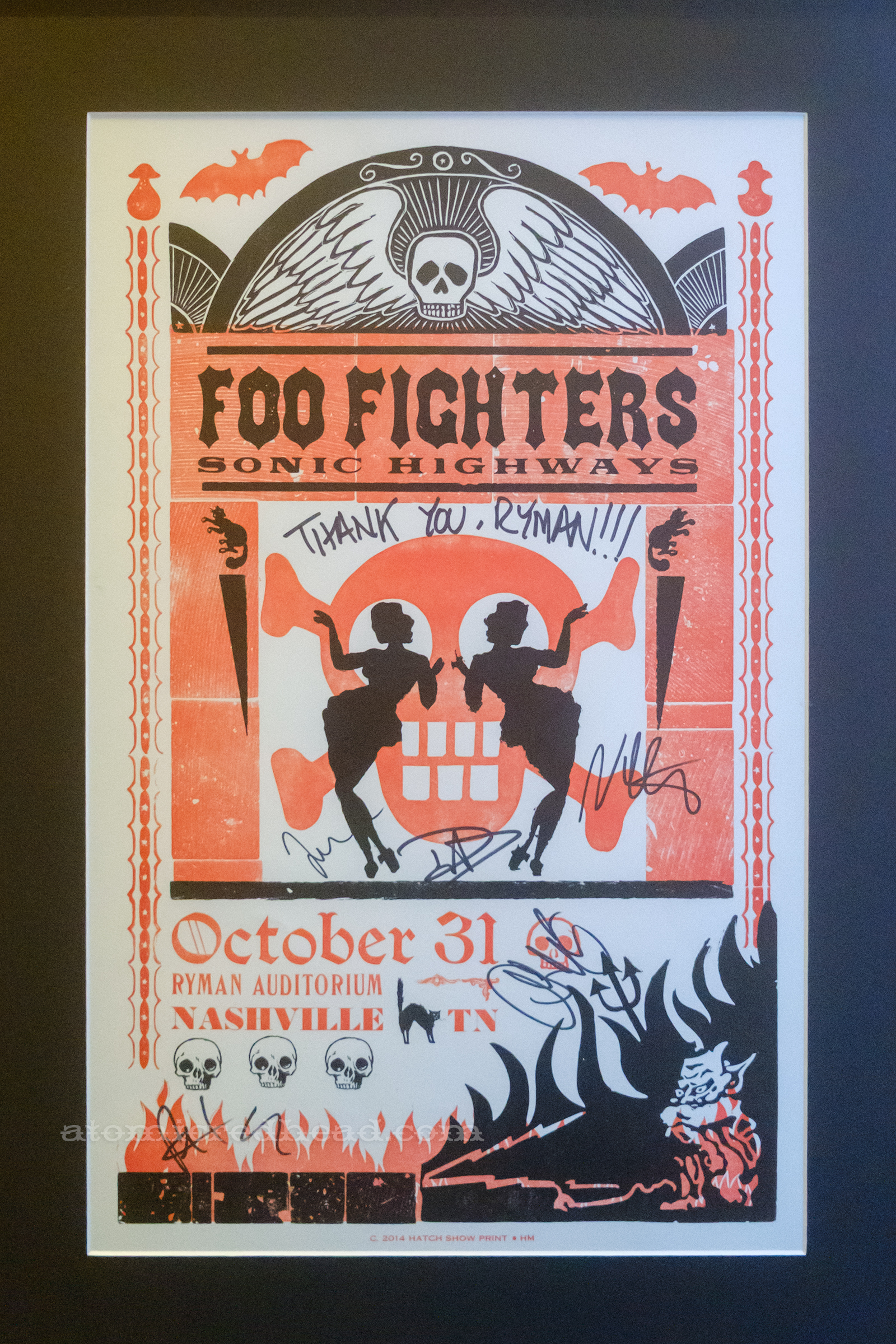 A poster that emulates a tombstone, for a Halloween performance by the Foo Fighters.