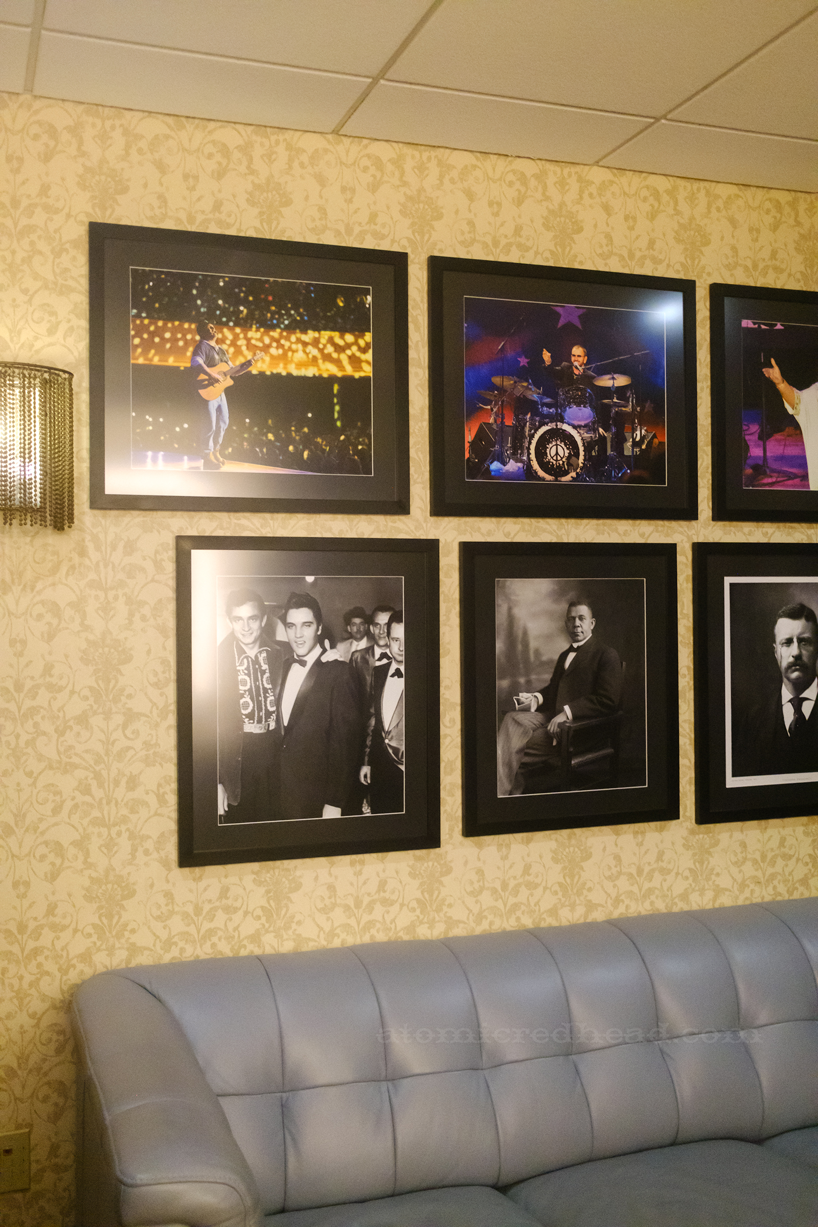 View of the "Legends" dressing room with framed photos of various icons, including Booker T. Washington, President Teddy Roosevelt, Johnny Cash, and Elvis Presley.