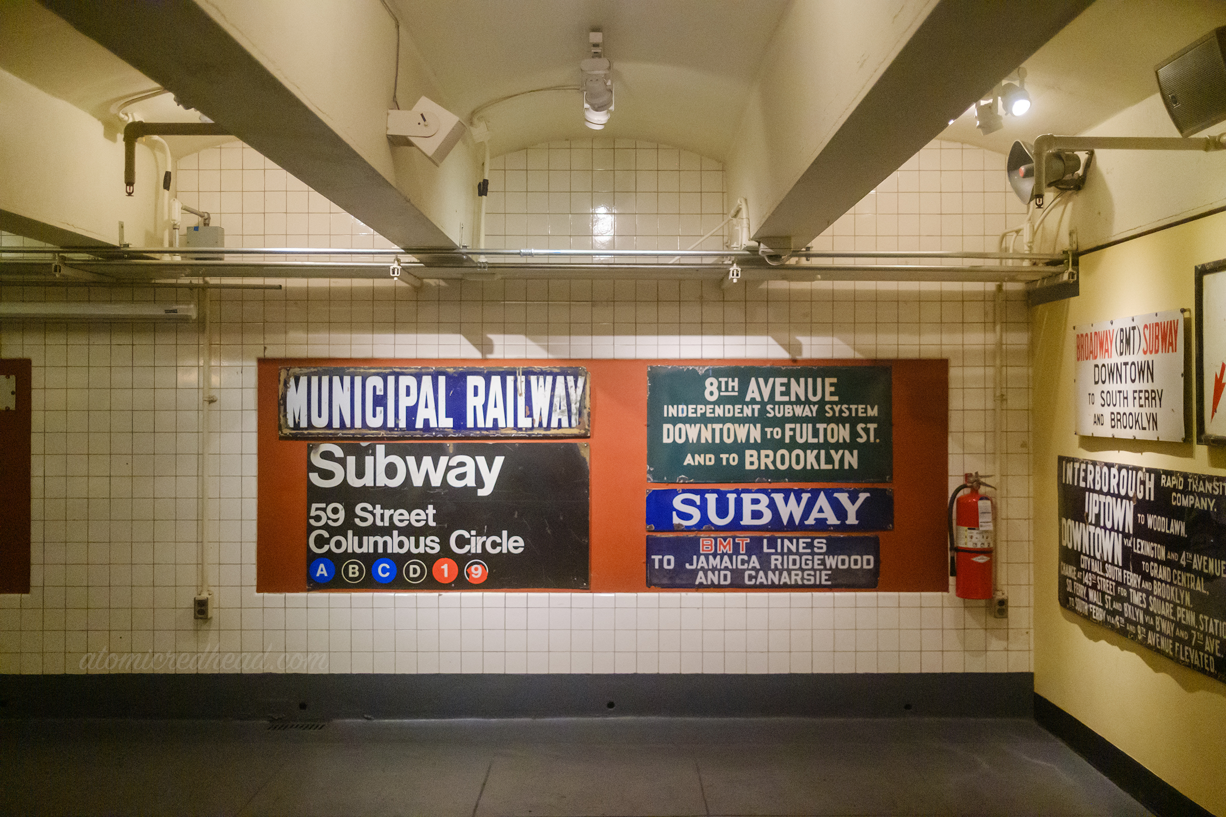 A collection of vintage subway signs.