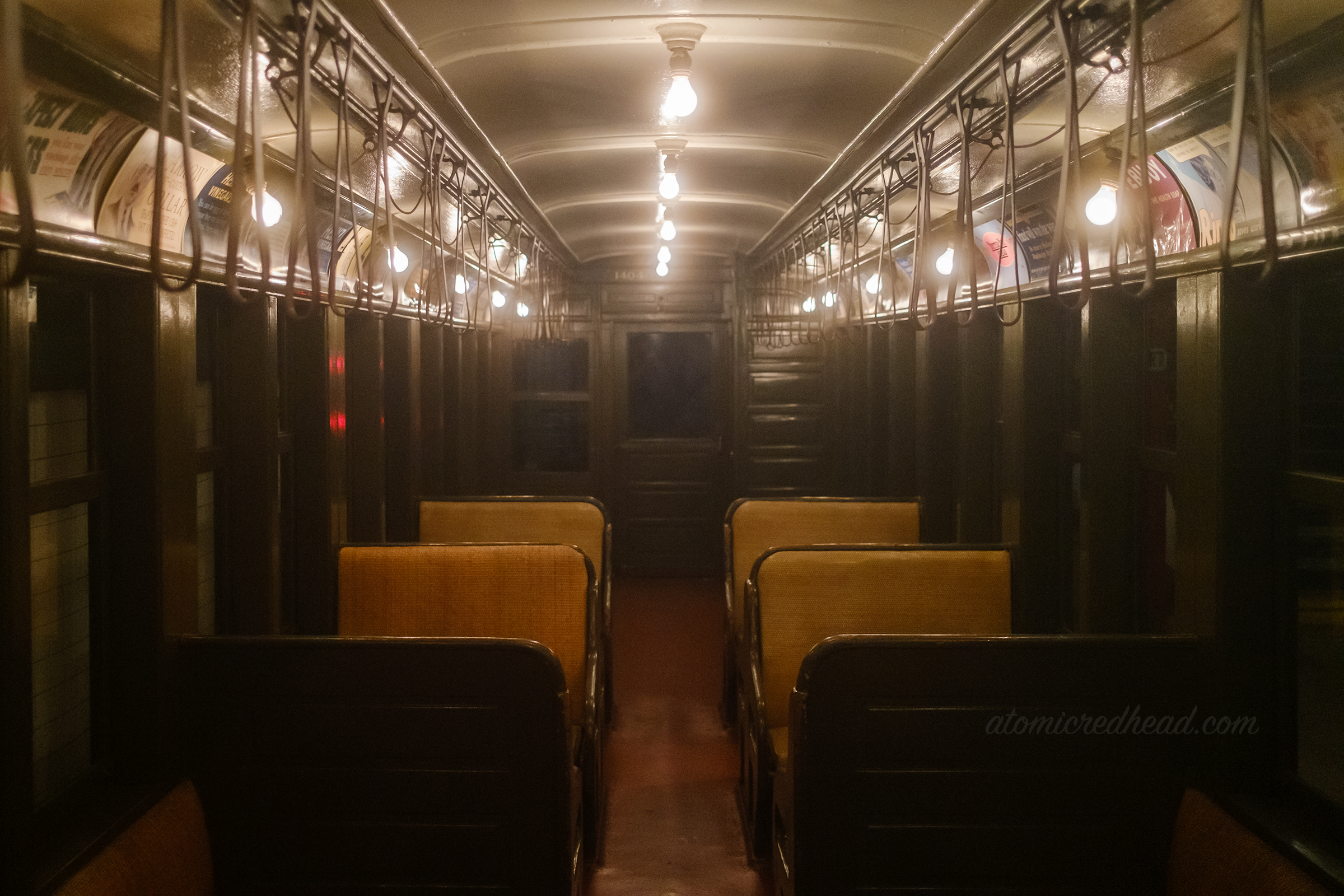 Inside an old subway car.