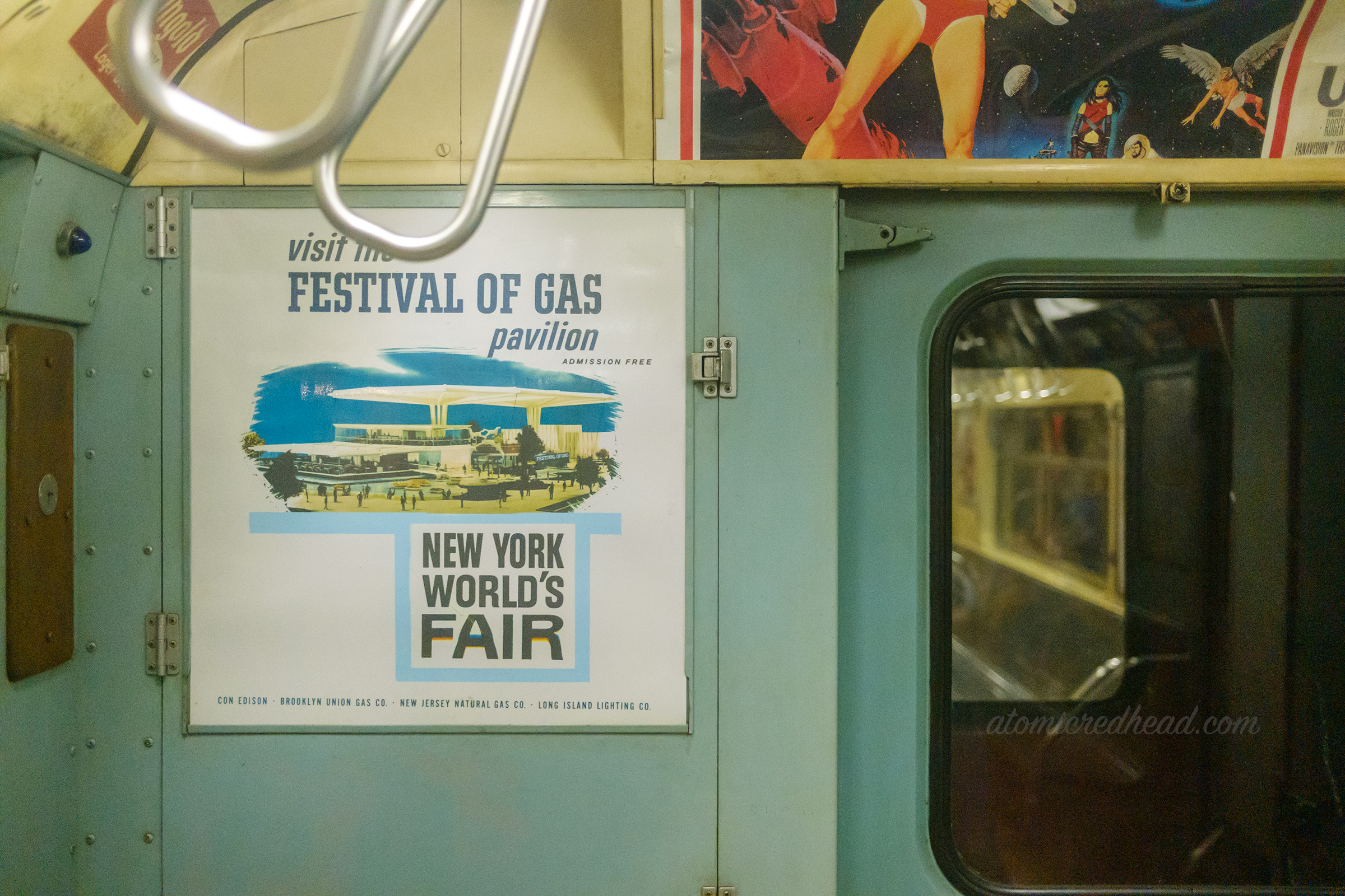An ad for the 1964 New York World's Fair inside a 60s era subway car.
