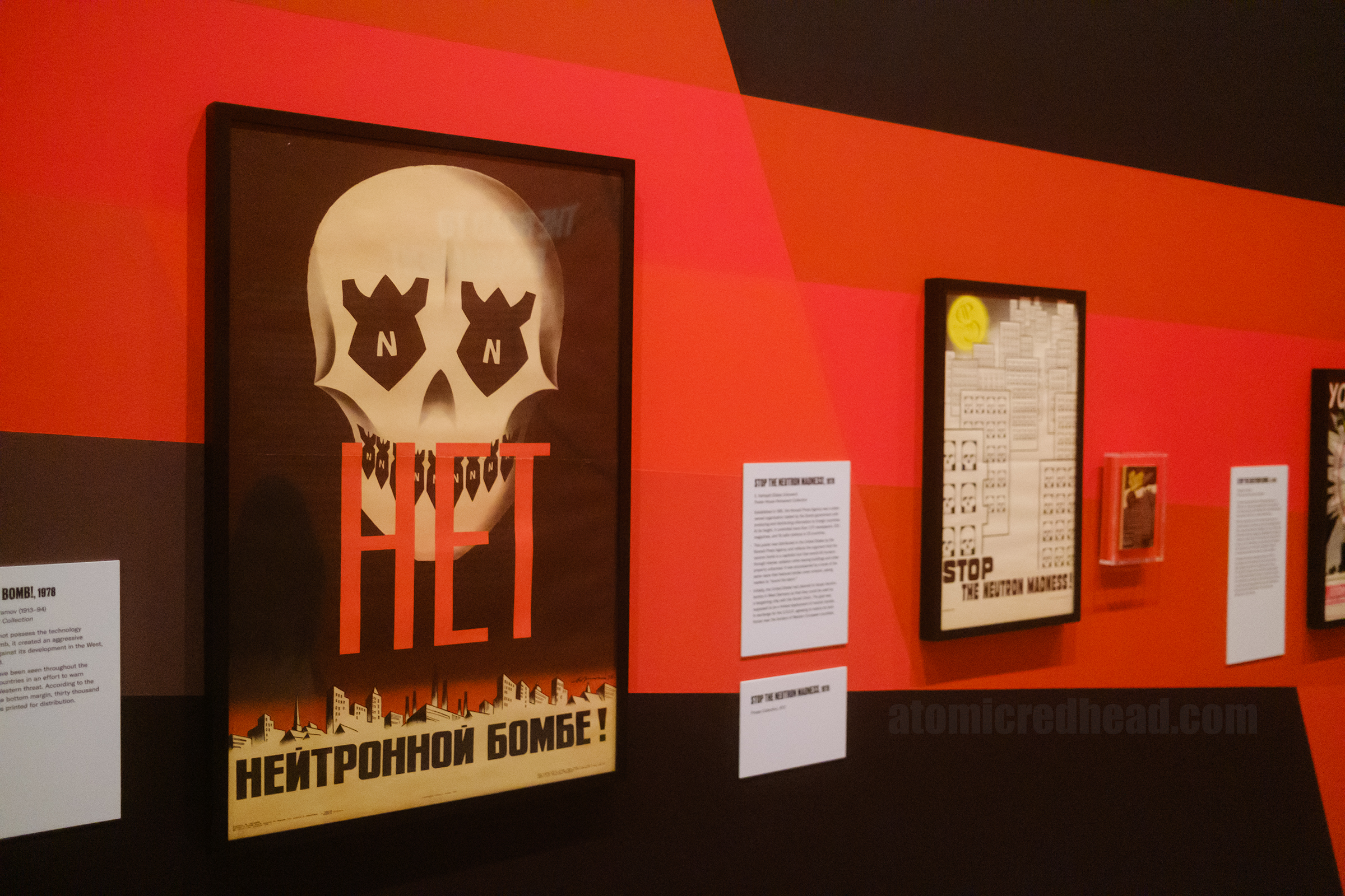 A skull with bombs that make up the eye sockets and teeth that reads "No to Neutron Bomb" in Russian. by Mark Aleksandrovich Abramov.