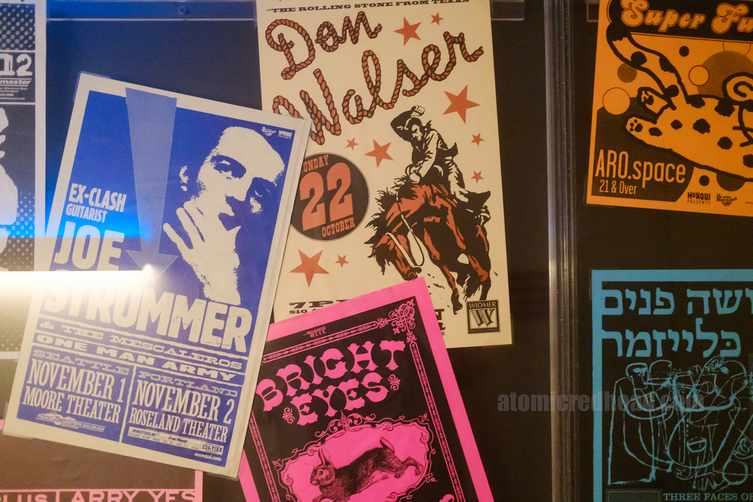 Colorful gig posters for Joe Strummer and Dan Walser.