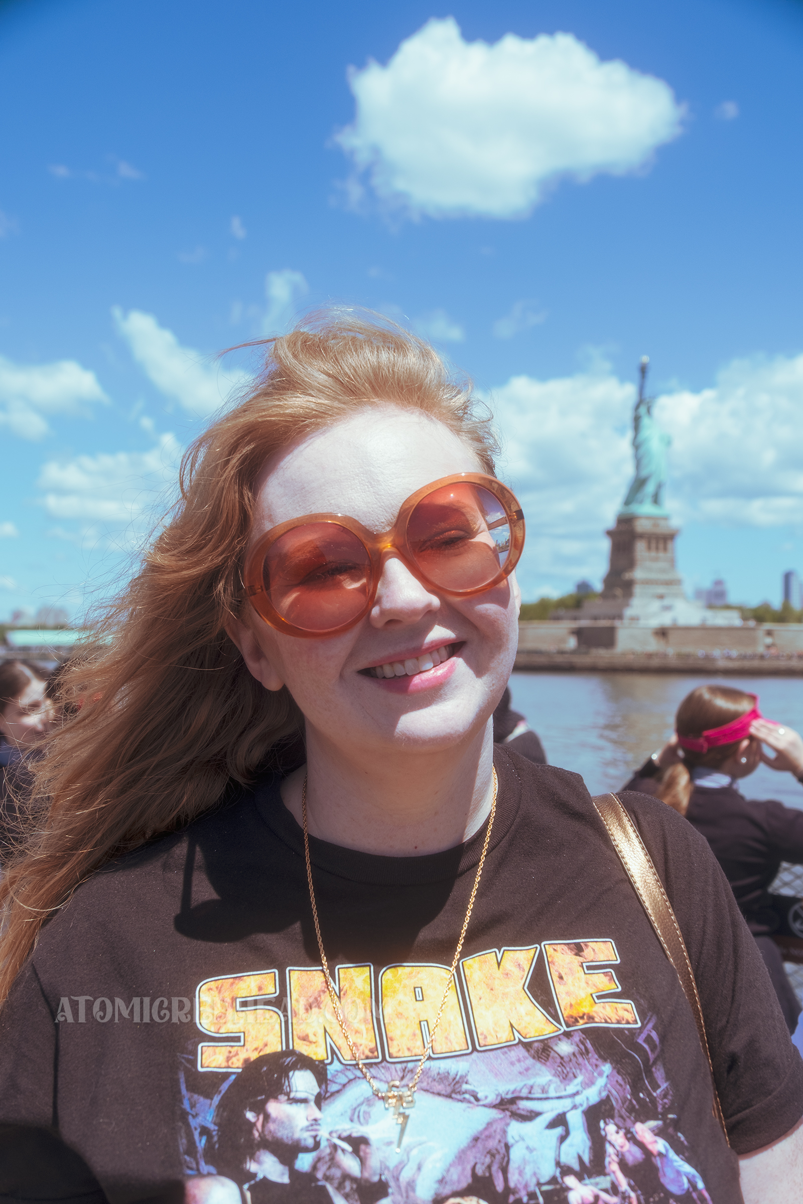 Myself standing in front of the Statue of Liberty.