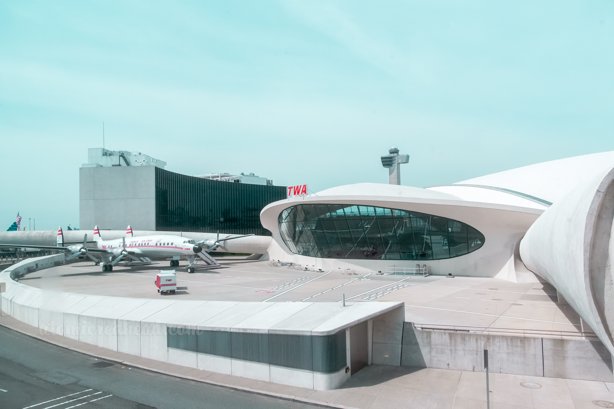 Exterior view of the old runway with an old plane resting.