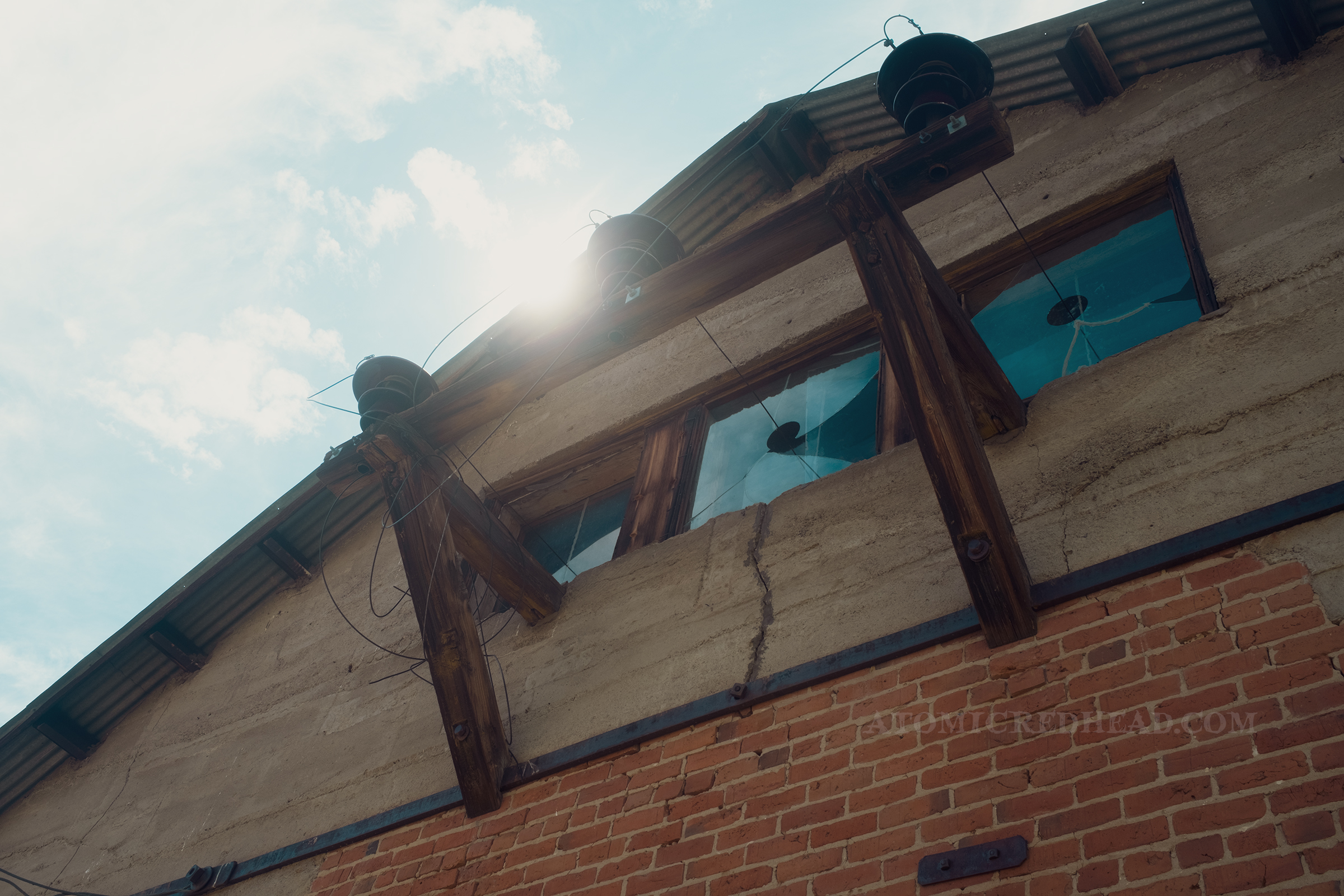 Exterior of the Hydro-Electric Power Substation, with broken windows.