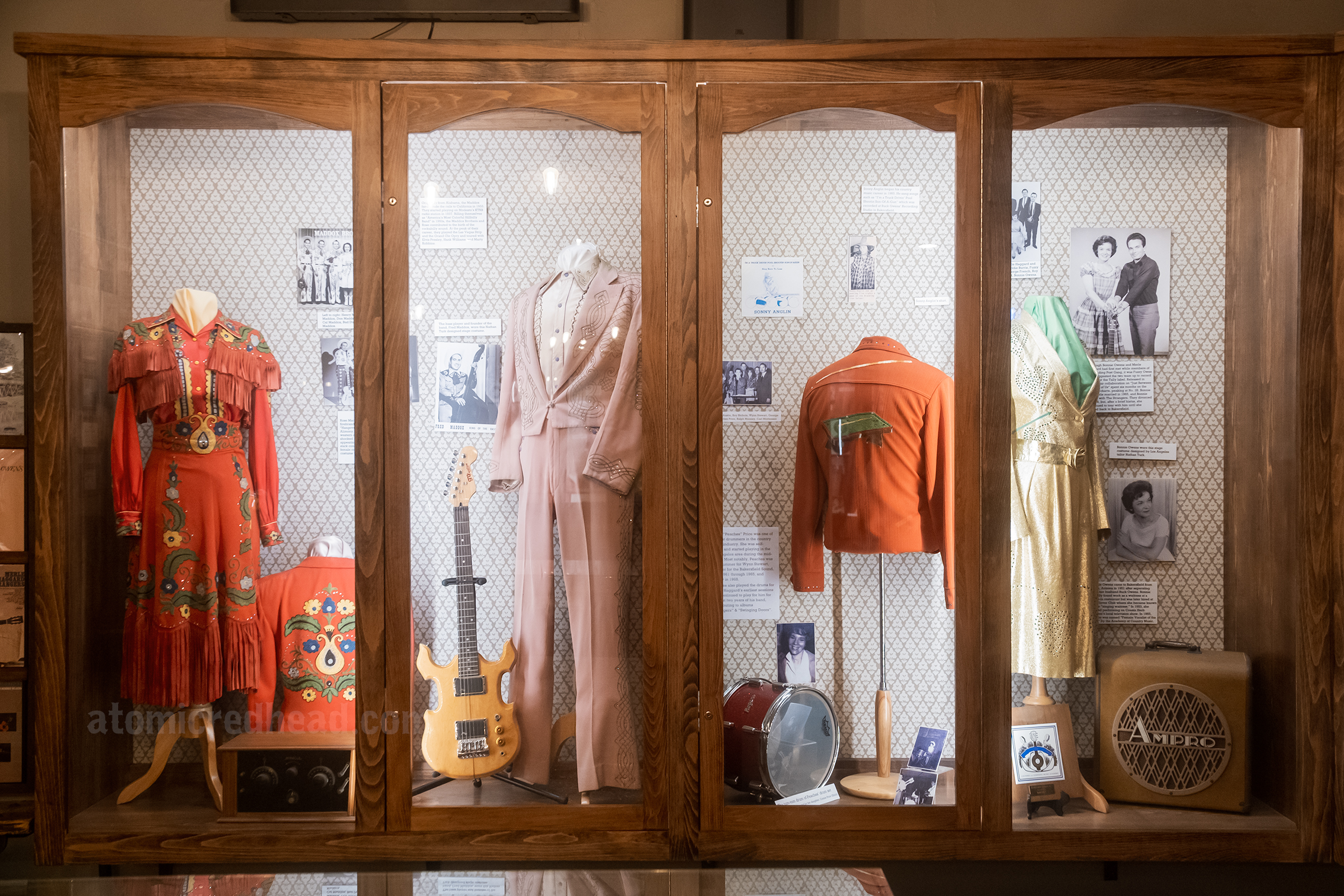 Display cases filled with vintage western wear.
