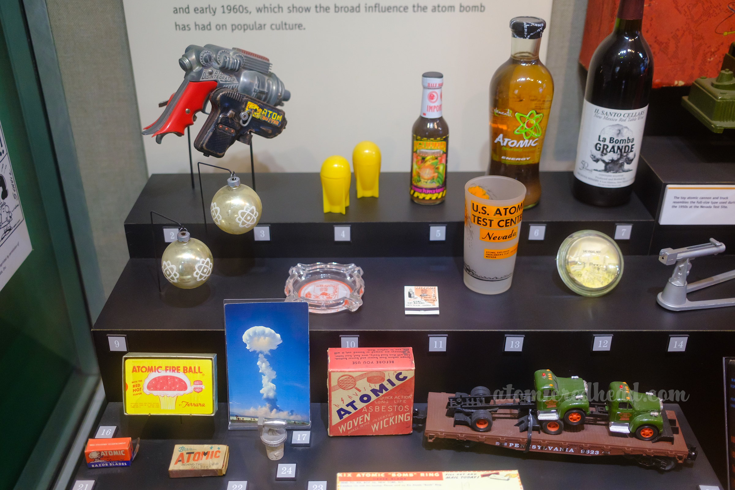Collection of items that were inspired by atomic imagery, including Christmas ornaments, toys, salt and pepper shakers, and more.