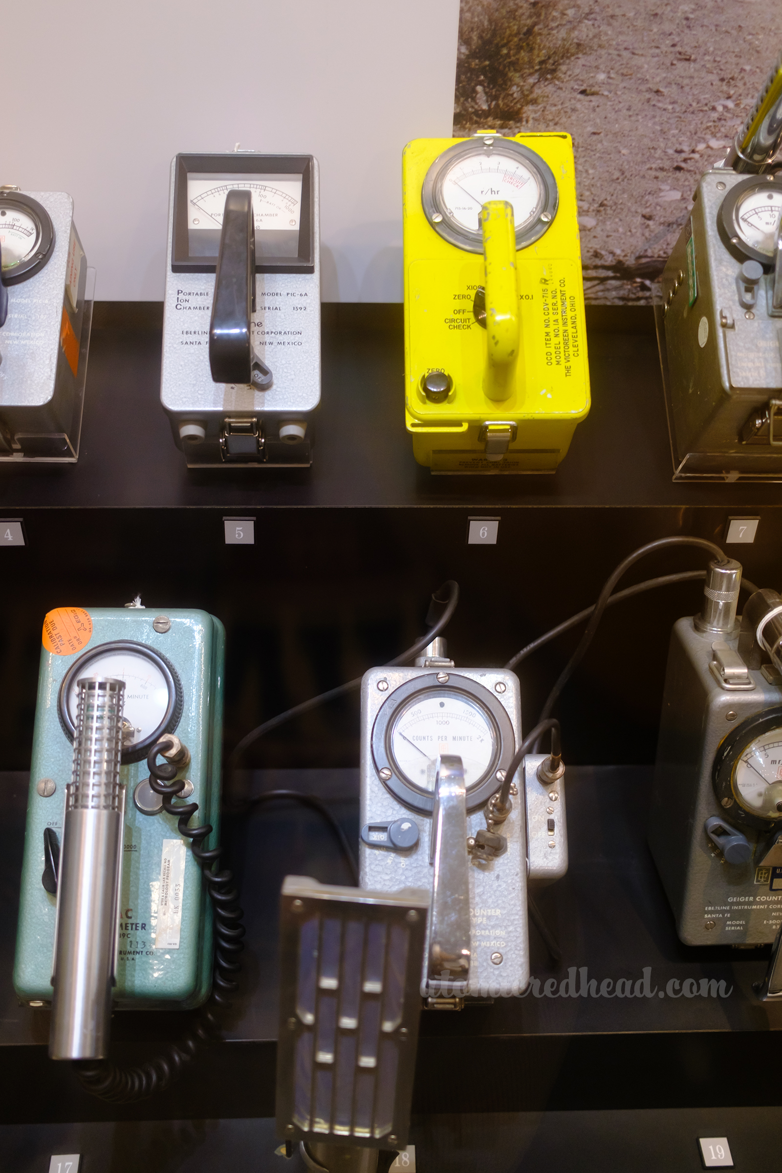 A collection of vintage geiger counters. 