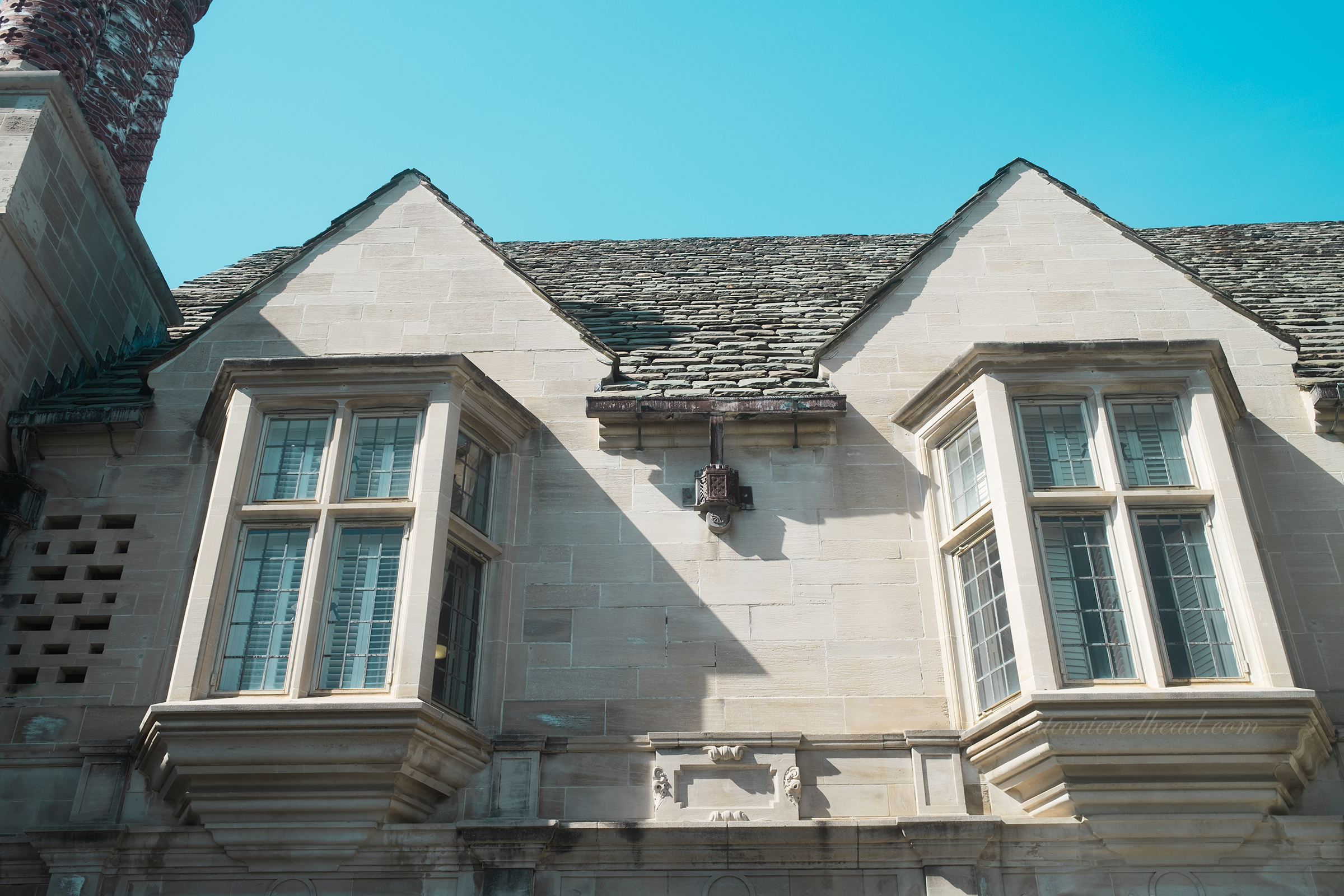 A pair of bay windows as seen from the outside.