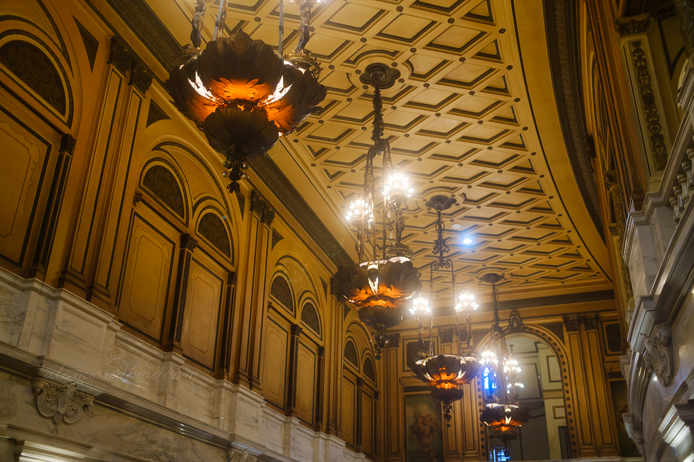 View of the chandeliers hanging in the lobby.