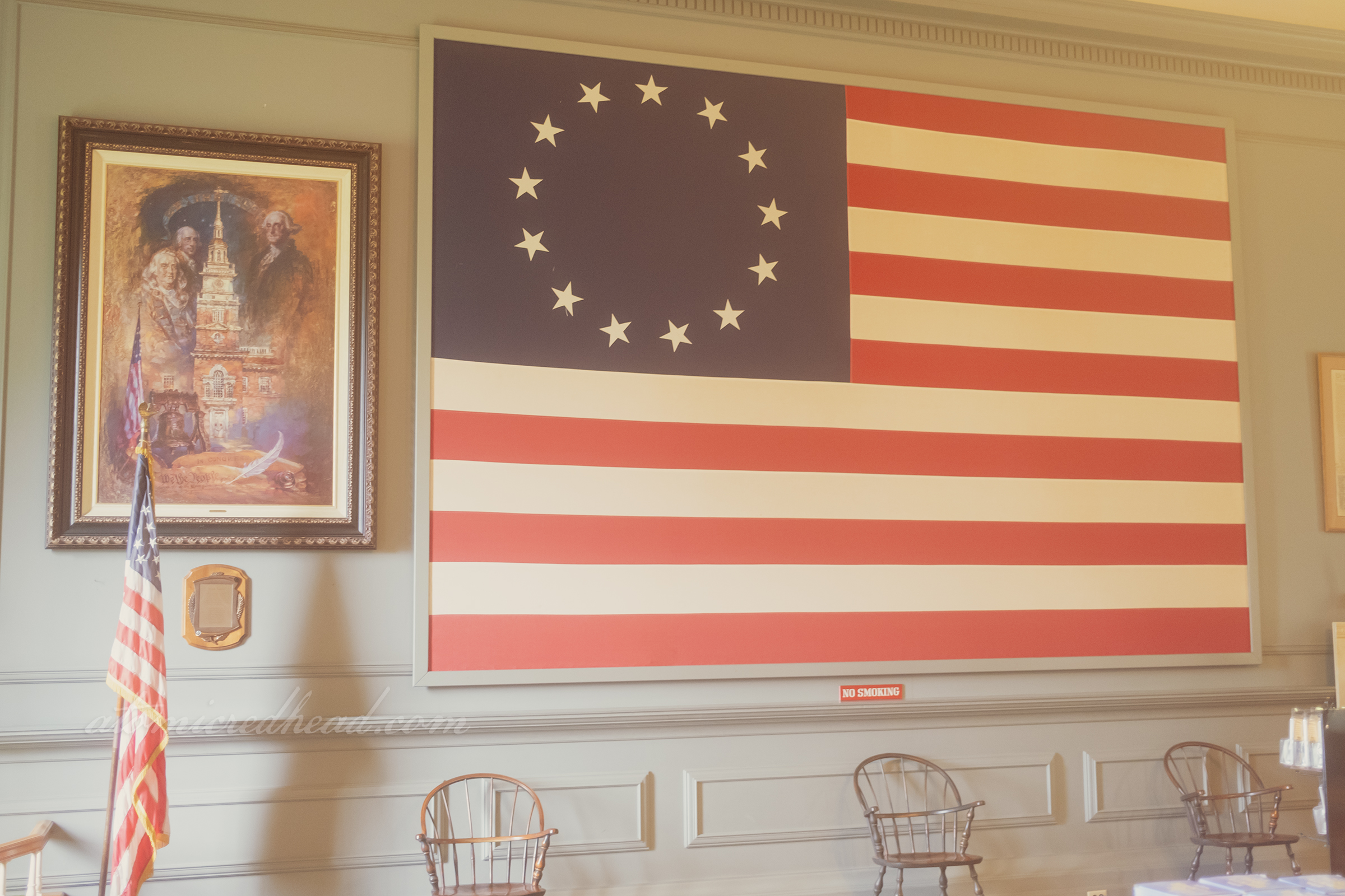 America's first flag hangs proudly on a wall inside.