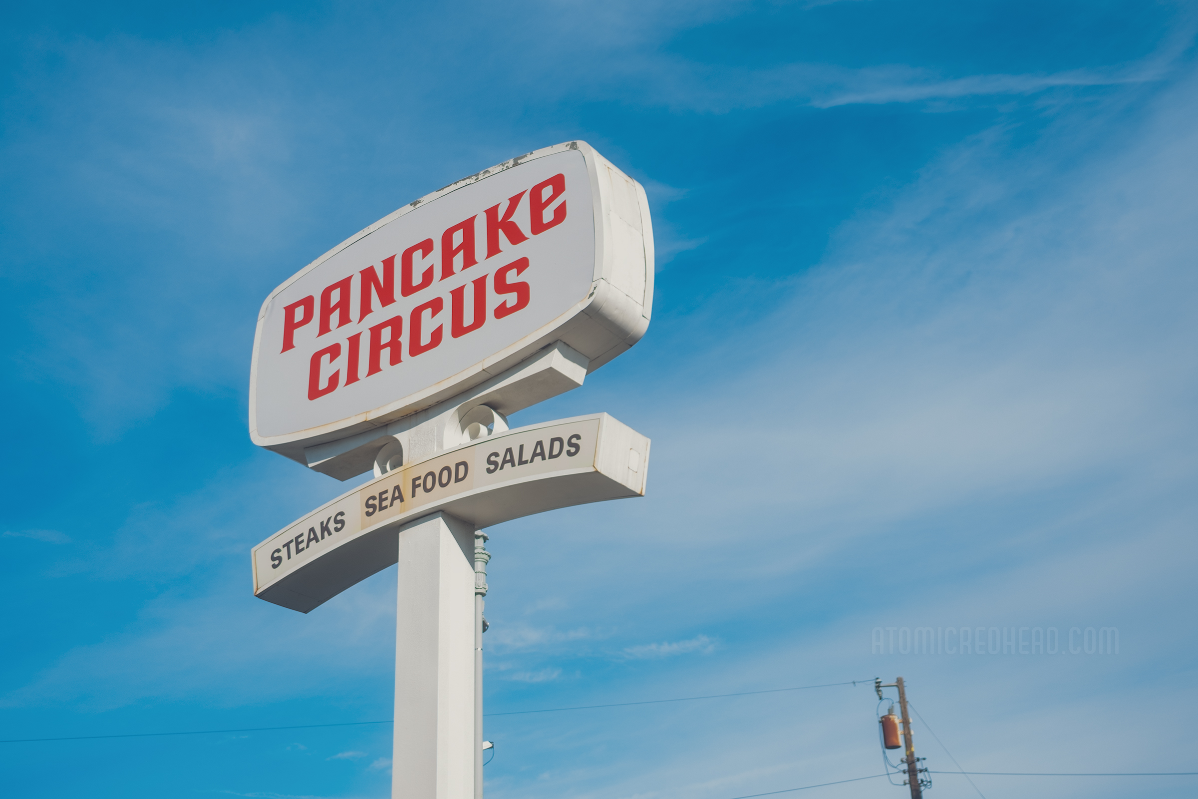 A large white sign outside reads "Pancake Circus" in large red letters.