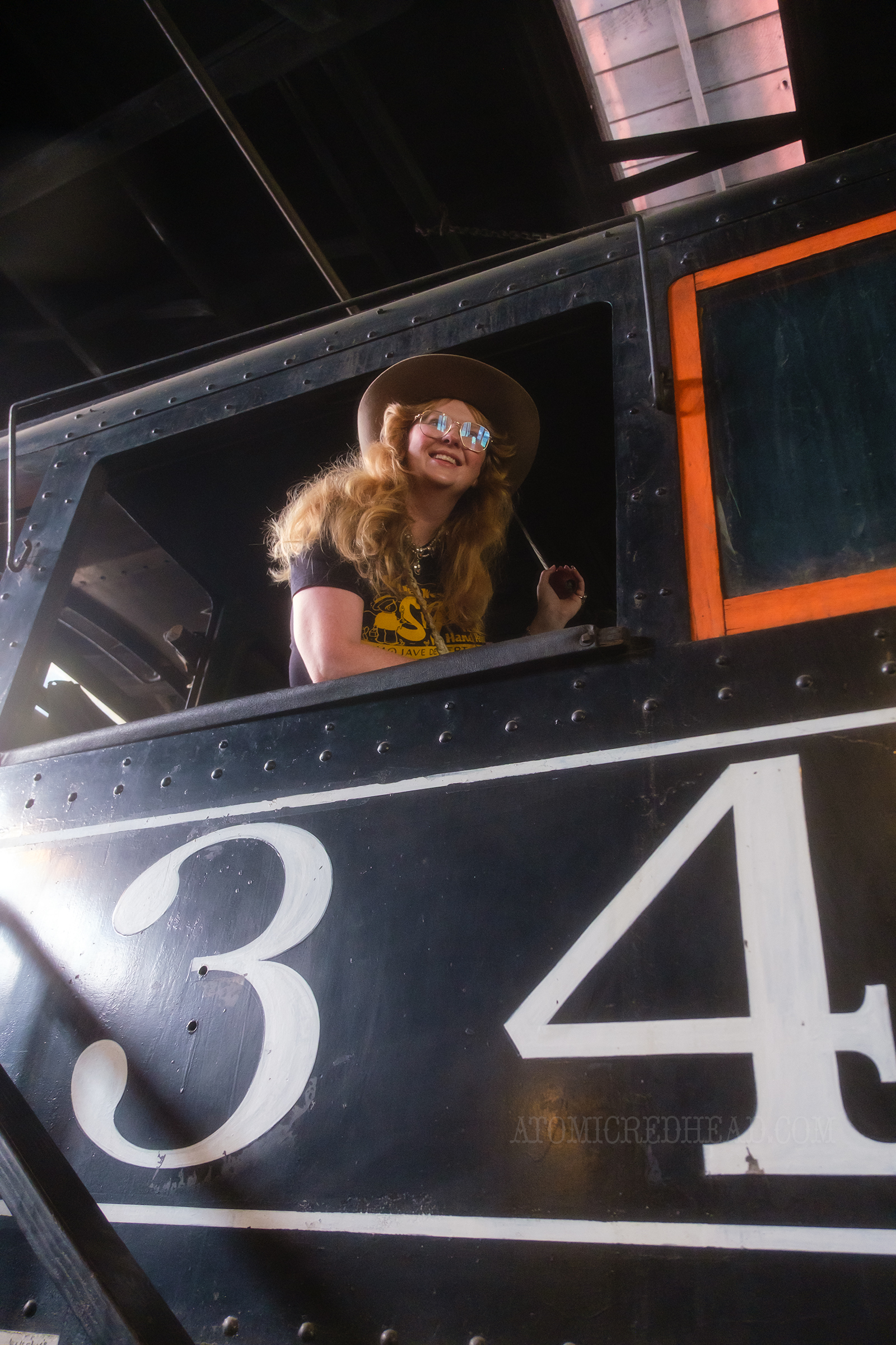 Myself sitting in the cab of one of the engines.