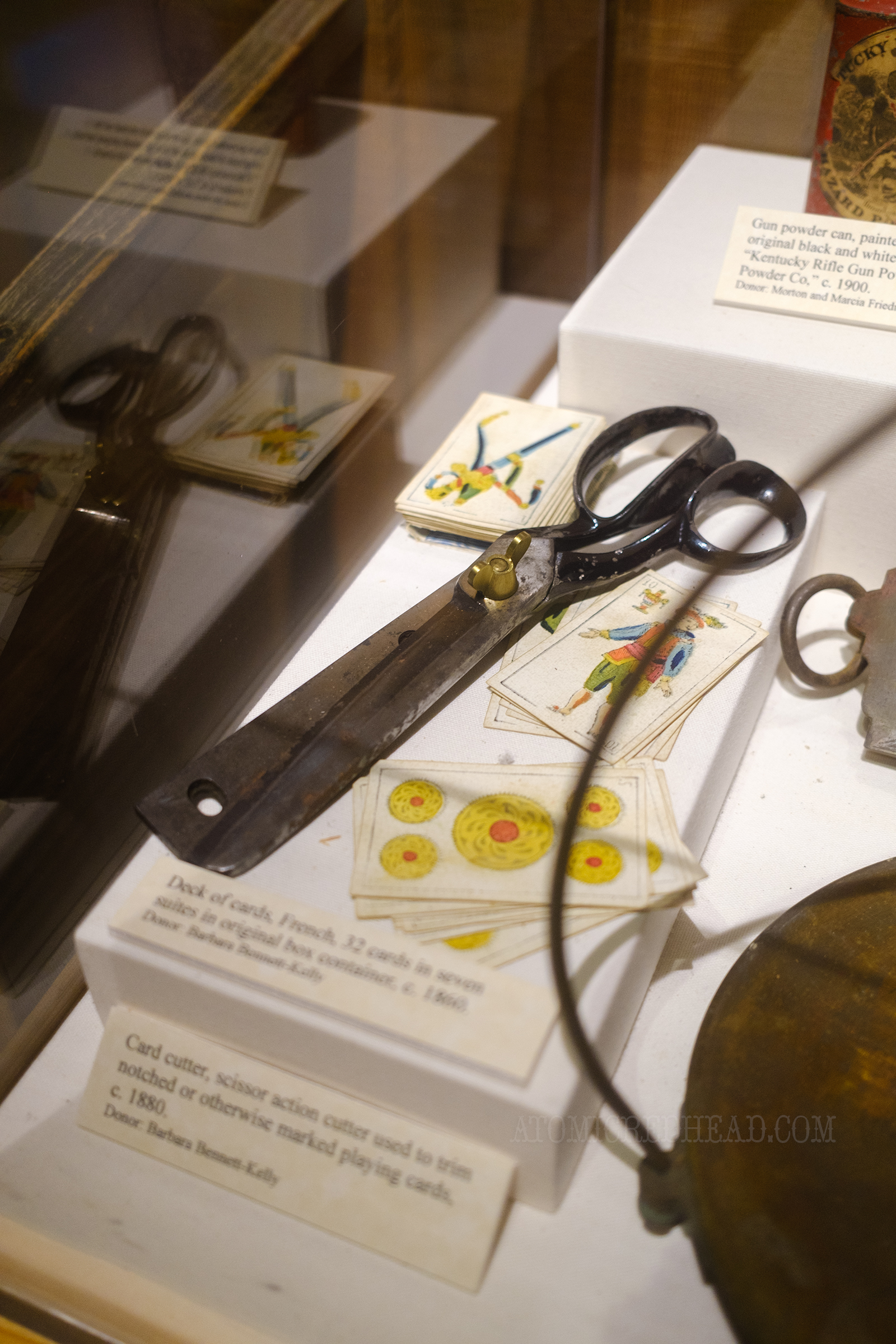 A special pair of scissors used trim playing cards to cheat.