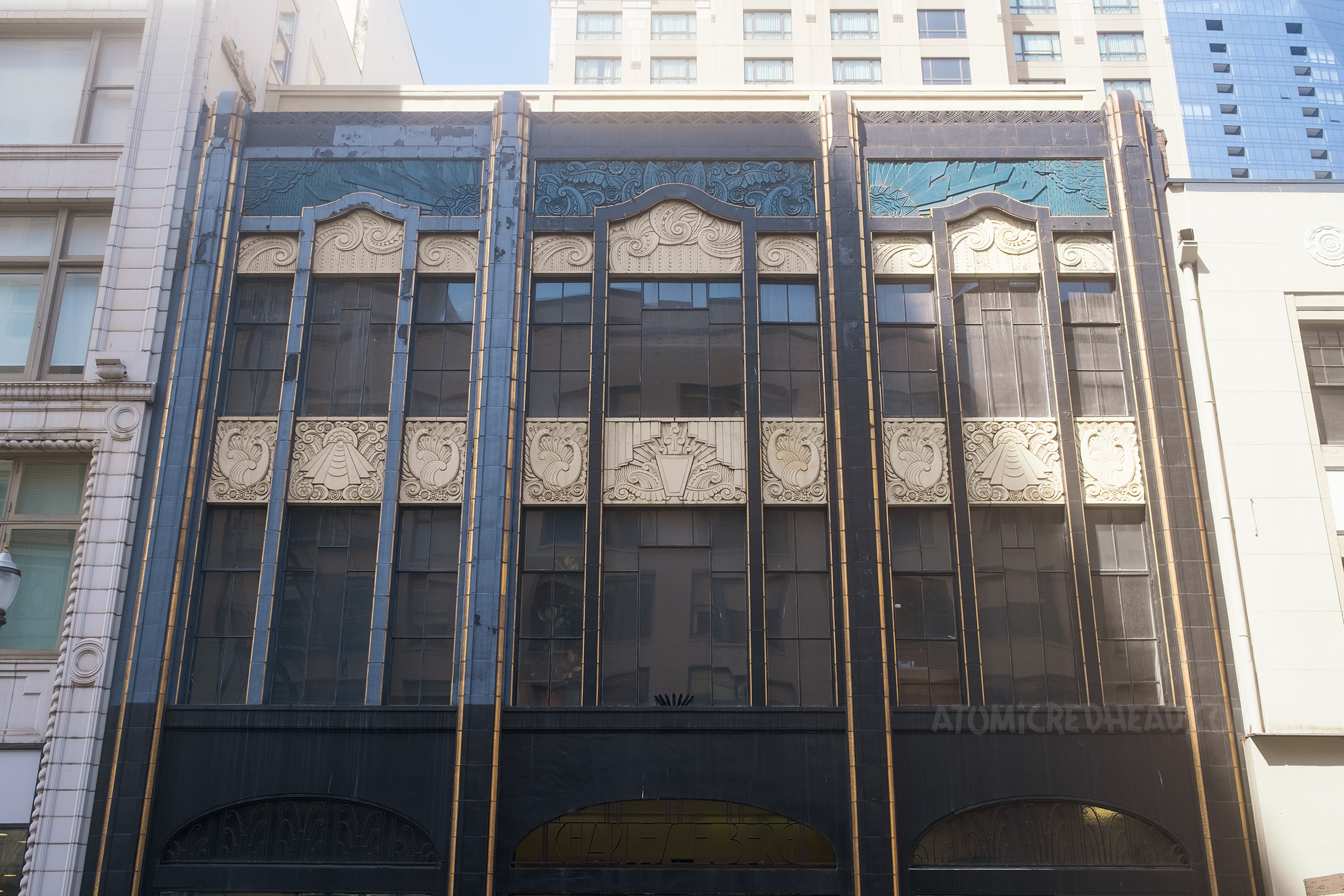 A large black and gold Art Decor building.