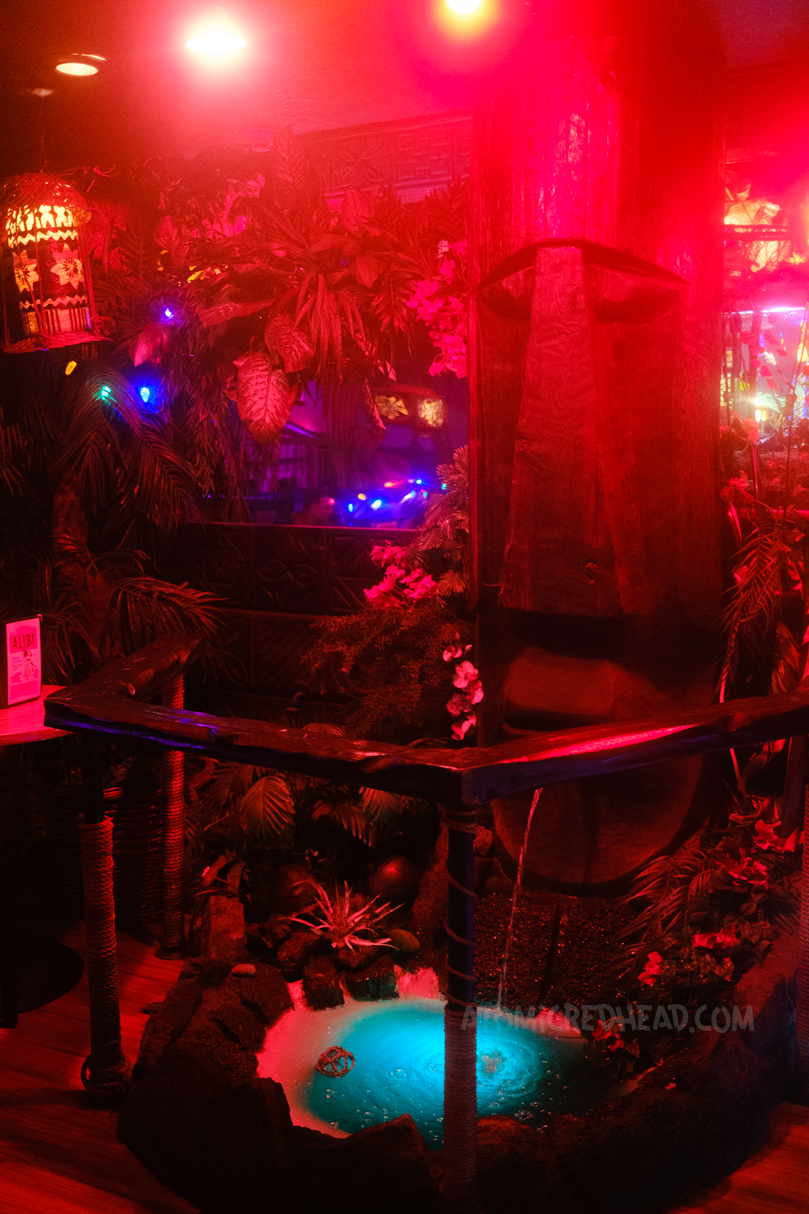 A large tiki is part of a fountain.