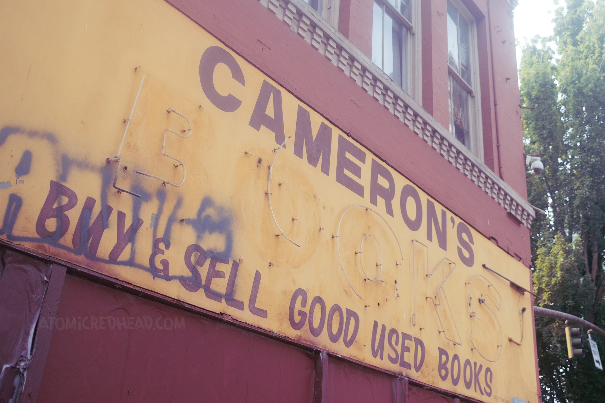 Exterior Cameron's, broken neon once read "BOOKS"