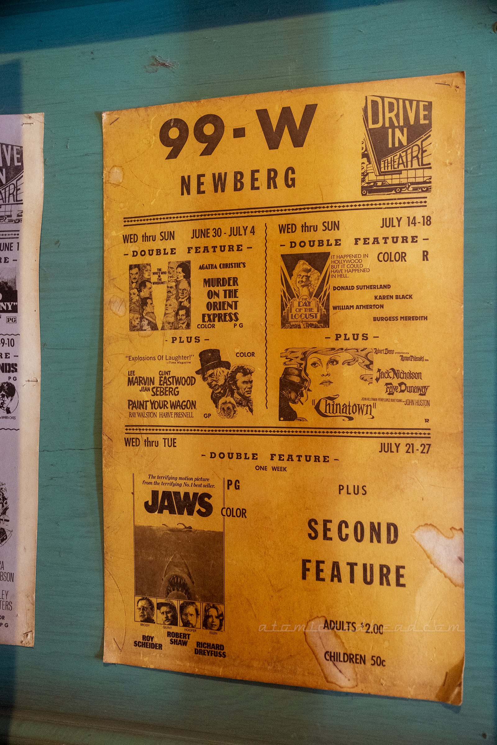 A poster advertising the movies showing in the 1970s.